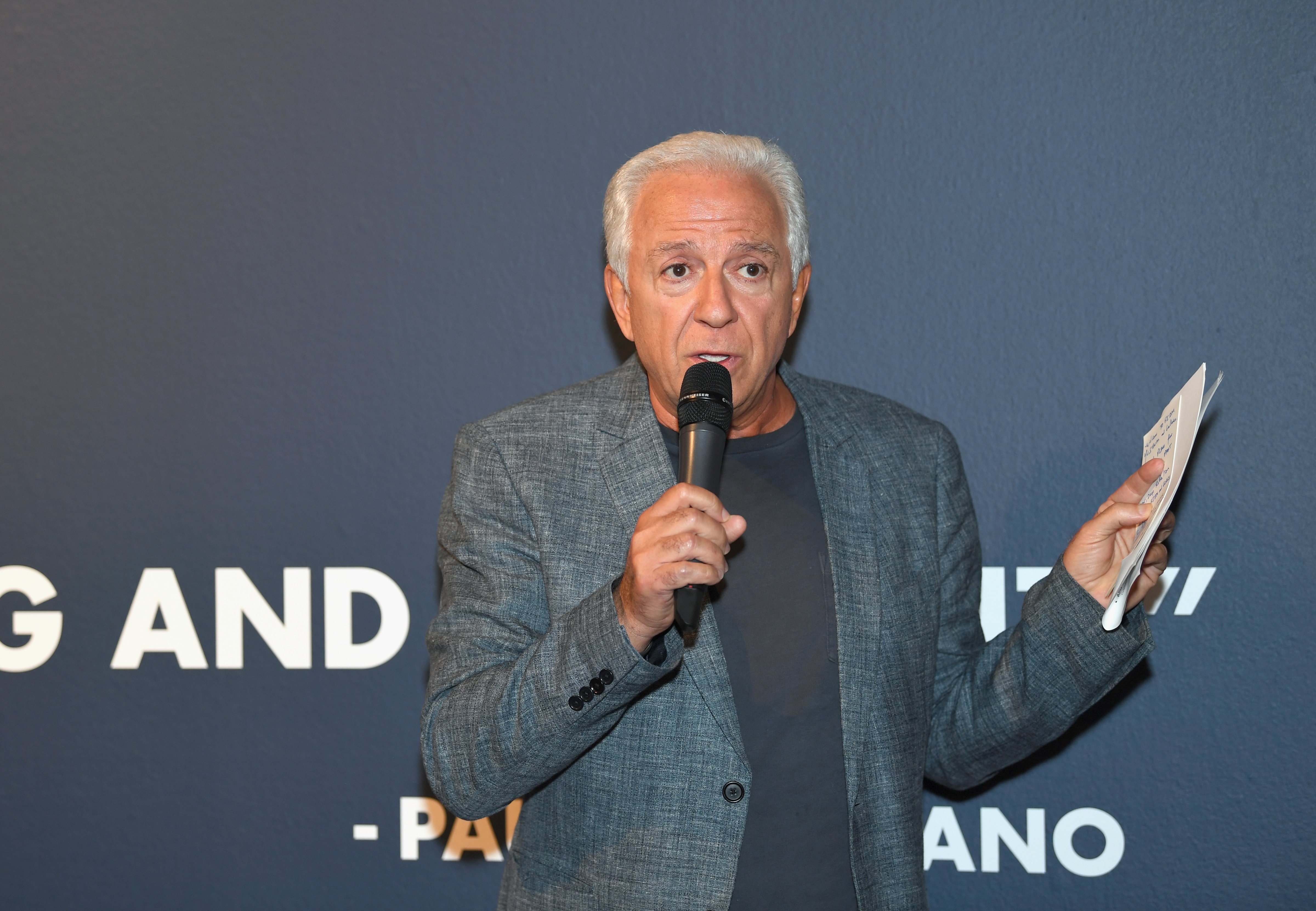 Fashion designer and co-founder of Guess? Inc. Paul Marciano speaks at GUESS Celebrates 35 Years with Opening of Exhibition at the FIDM Museum &amp; Galleries at FIDM Museum &amp; Galleries on the Park on June 5, 2017 in Los Angeles, California. (Emma McIntyre—Getty Images for GUESS, Inc.)