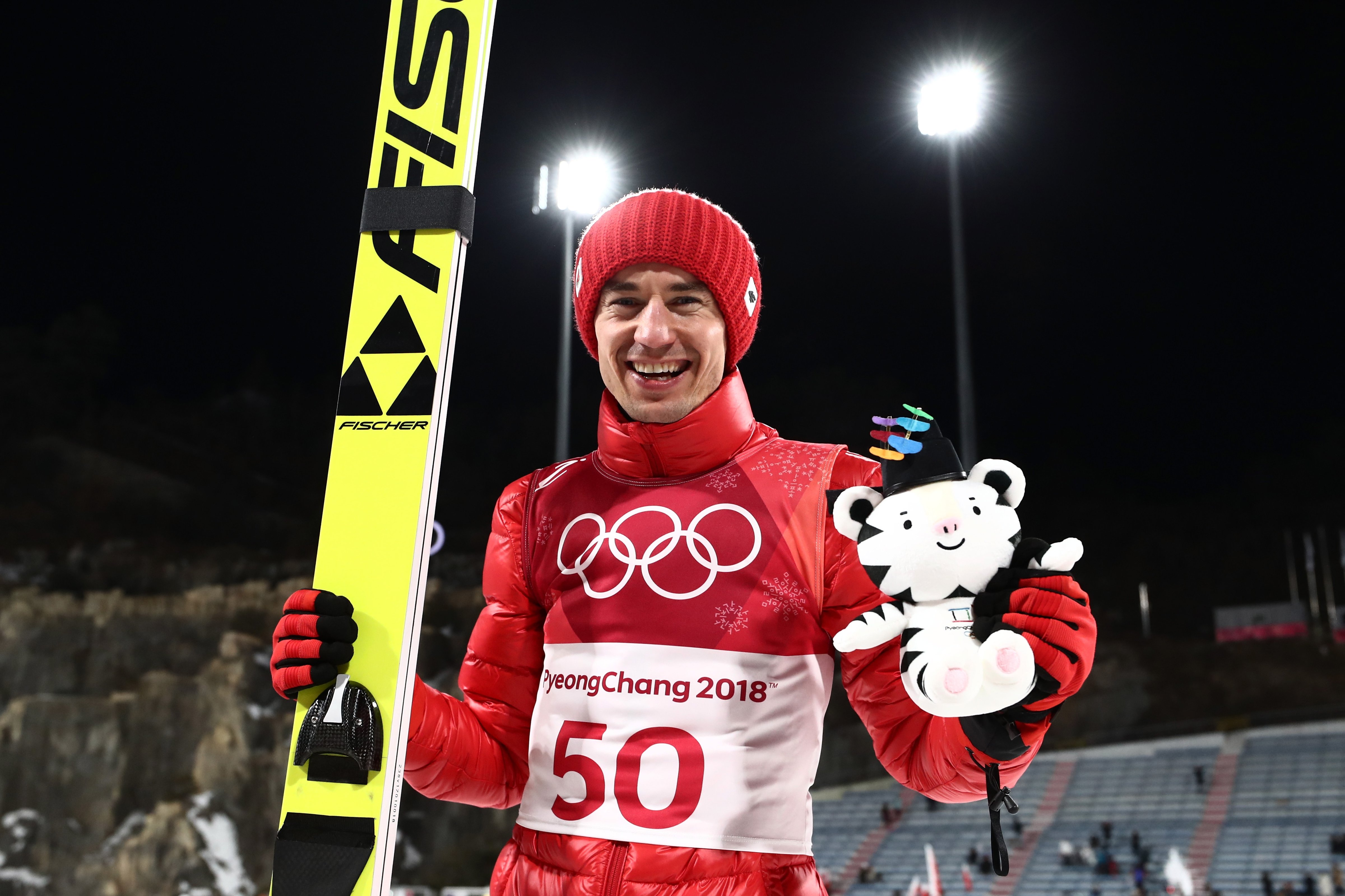 Kamil Stoch of Poland celebrates following the Ski Jumping - Men's Large Hill on day eight of the PyeongChang 2018 Winter Olympic Games . (Lars Baron—Getty Images)