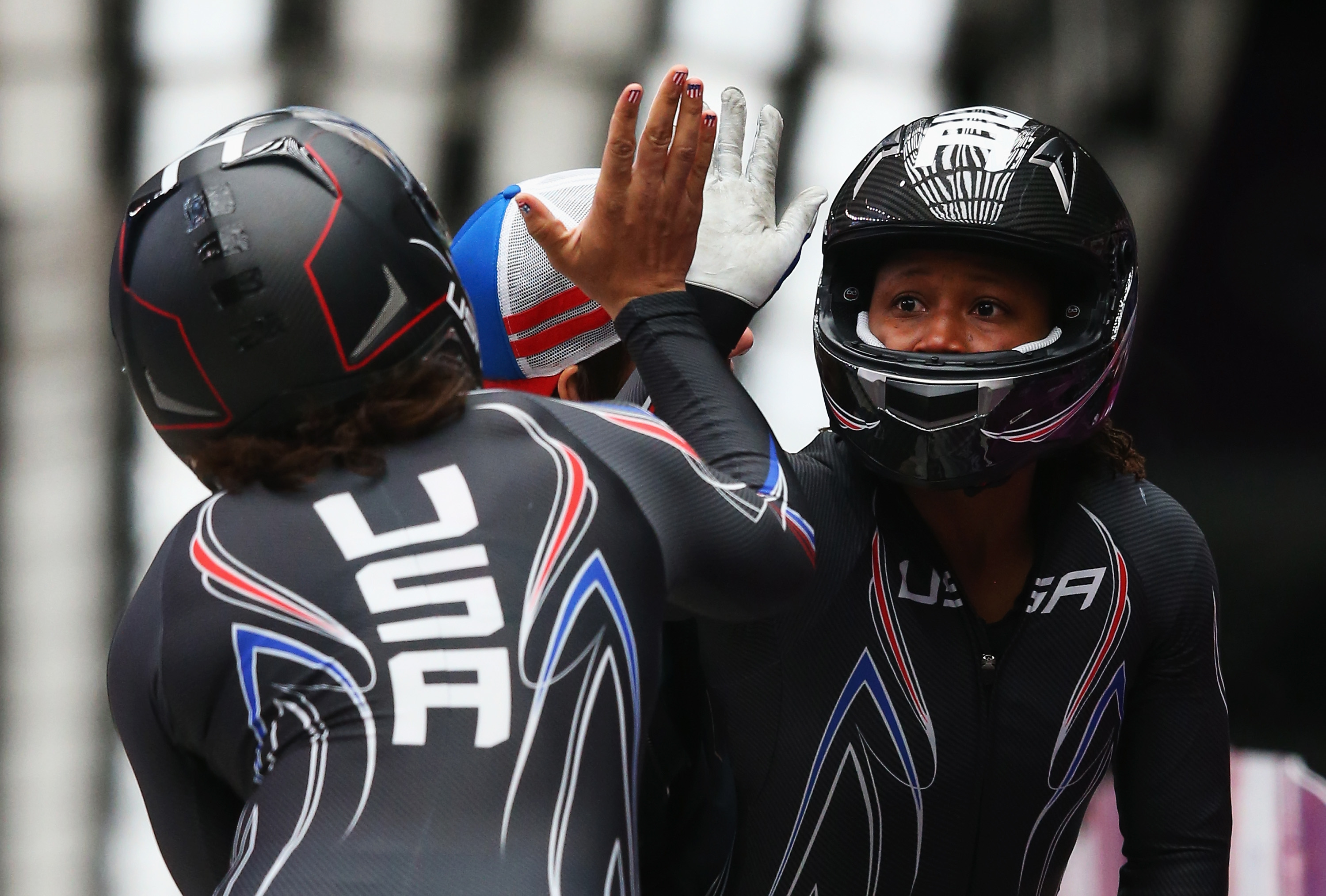 Elana Meyers (left) and Lauryn Williams of the United States team 1 celebrate during the Women's Bobsleigh at the Sochi 2014 Winter Olympics in Russia. Alex Livesey—Getty Images (Alex Livesey—Getty Images)