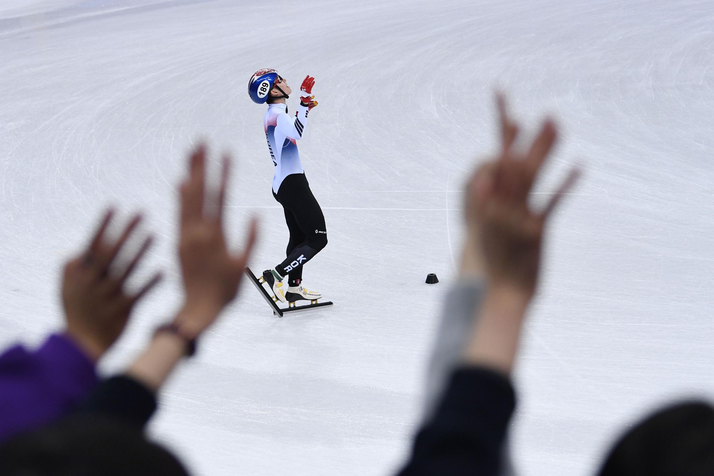 South Korea's Lim Hyojun celebrates after the men's 5,000m relay short track speed skating heat event on Feb. 13, 2018.