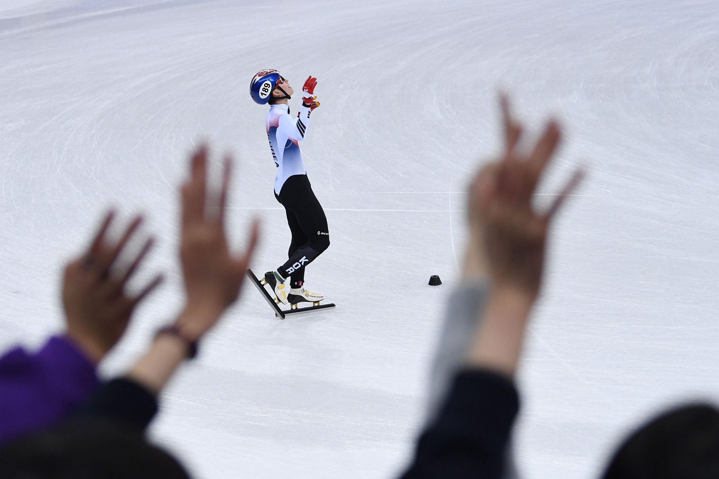 South Korea's Lim Hyojun celebrates after the men's 5,000m relay short track speed skating heat event on Feb. 13, 2018. (Roberto Schmidt—AFP/Getty Images:)