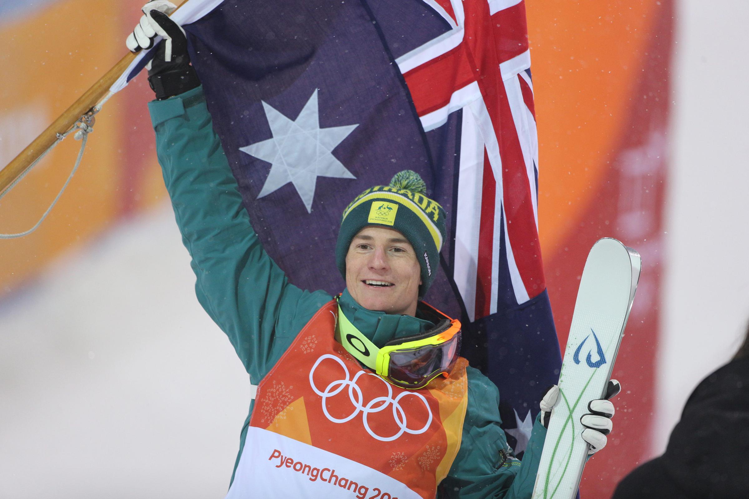 Matt Graham of Australia celebrates his silver medal in the Freestyle Skiing Men's Moguls competition on Feb. 12, 2018.