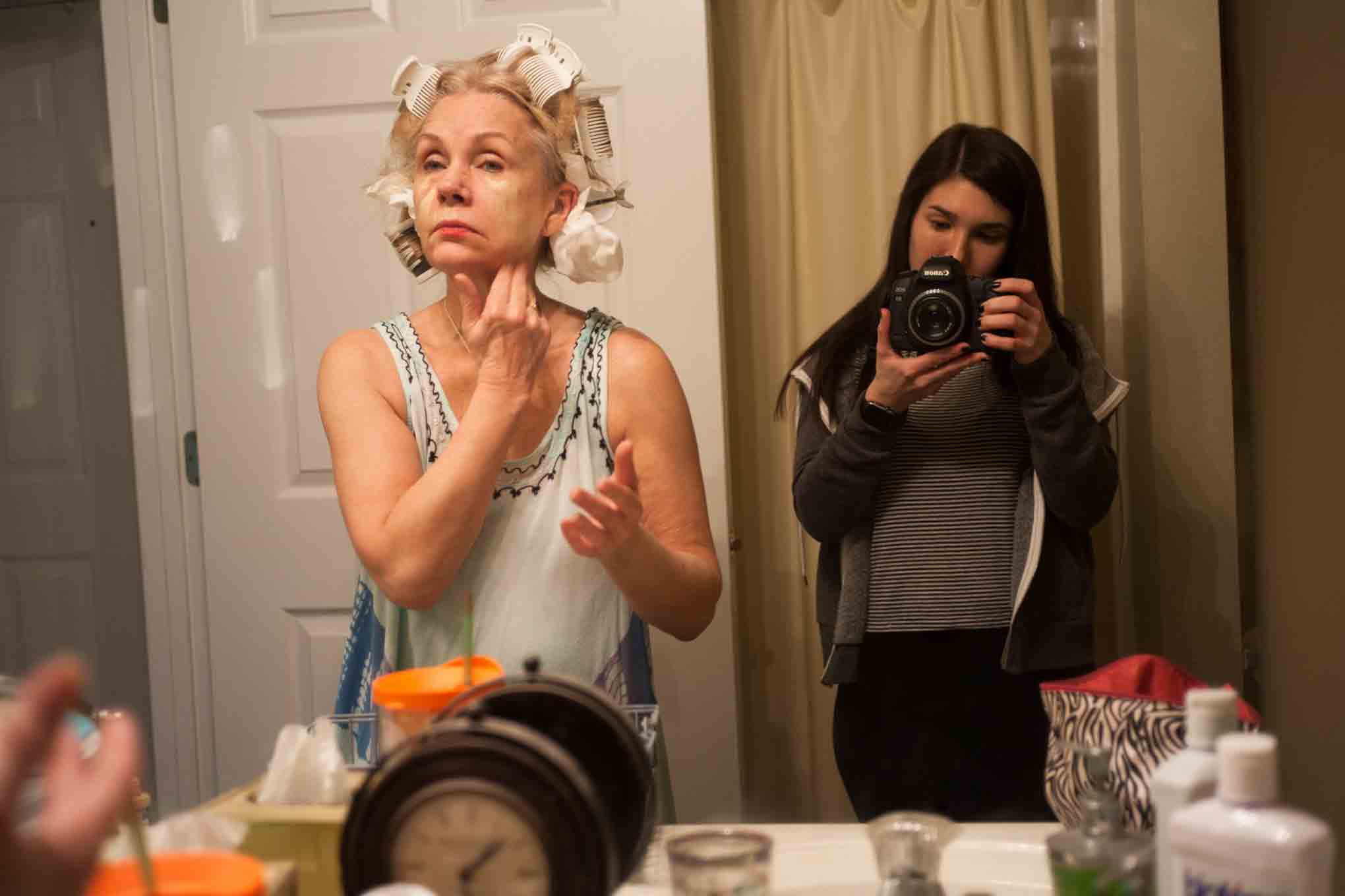Spitz calls this photo of her mother applying makeup Mom’s Mask