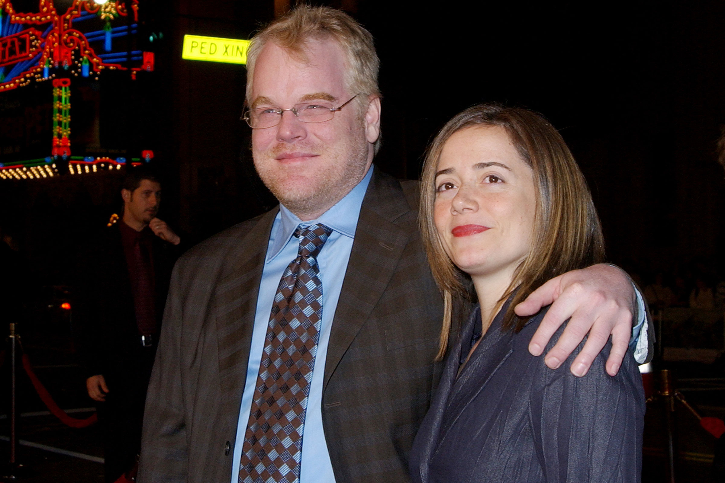 Philip Seymour Hoffman and Mimi O'Donnell at a premiere at Mann's Chinese Theater in Hollywood, California in 2004. (Jon Kopaloff—Getty Images)