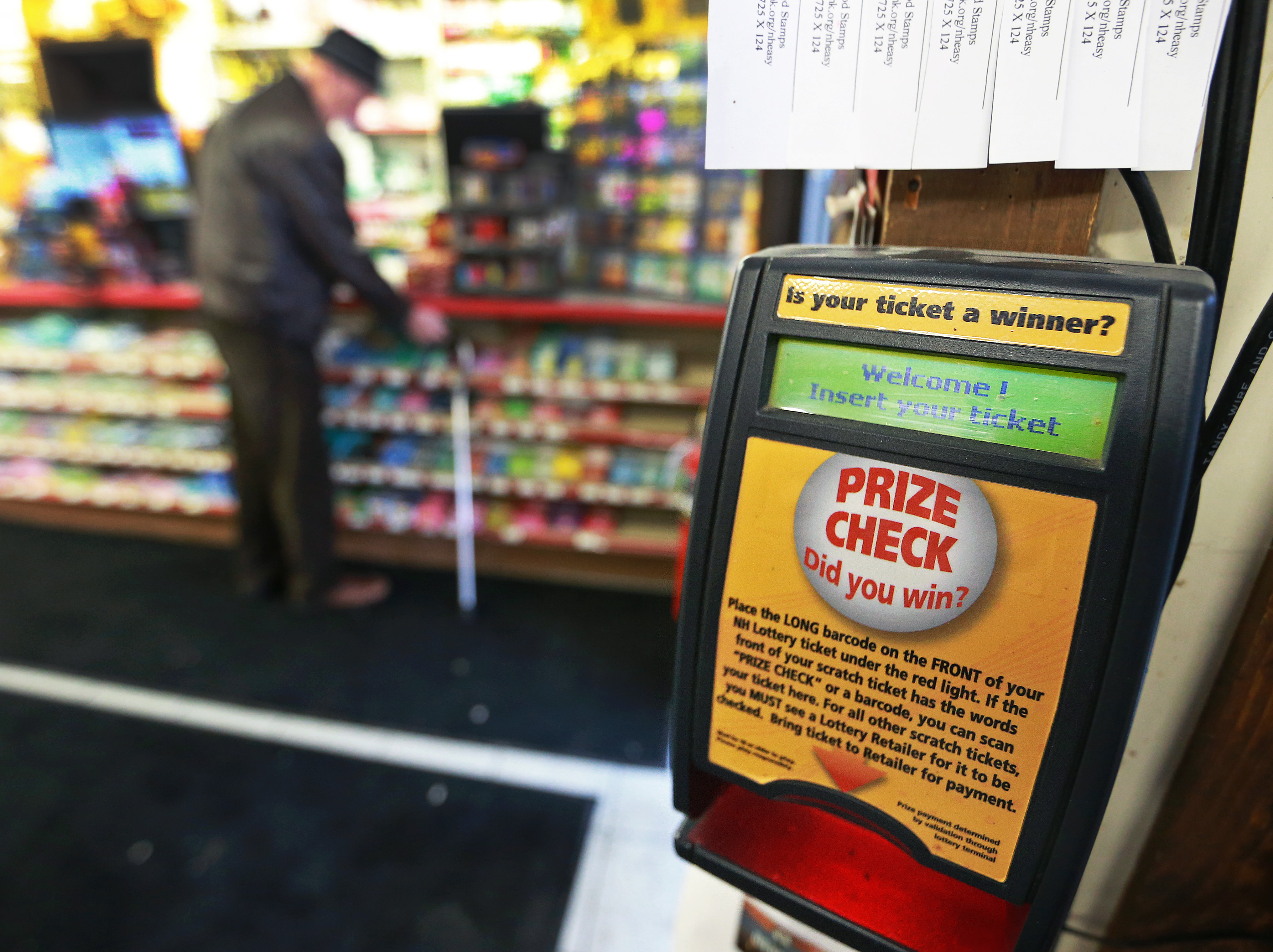 A ticket checking machine is pictured inside Reeds Ferry Market in Merrimack, NH, where a winning ticket in a $560 million Powerball jackpot was sold, on Jan. 8, 2018 (Boston Globe&mdash;Boston Globe via Getty Images)