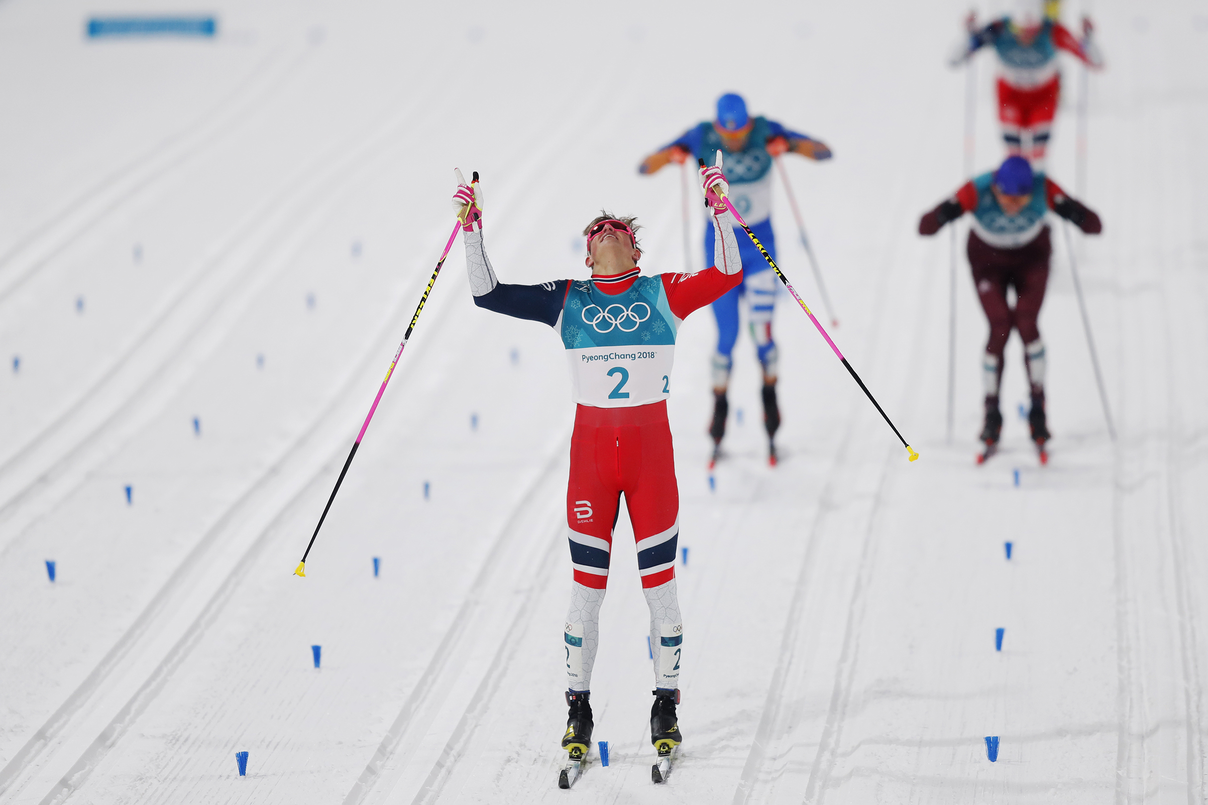 Johannes Hoesflot Klaebo of Norway celebrates after the victory during the Mens Individual Sprint Classic Finals on Feb. 13, 2018. (Nils Petter Nilsson—Getty Images:)