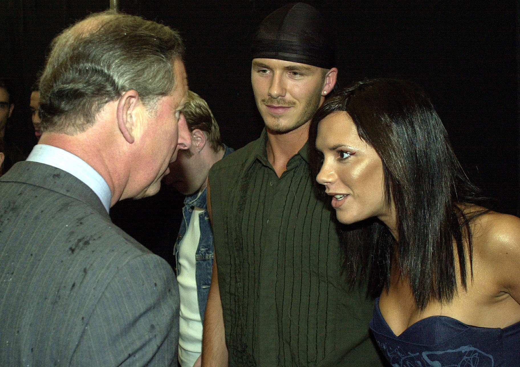 The Prince of Wales, (r) meets pop star Victoria Beckham (Posh Spice) and her footballing husband David at the Princes Trust Capital FM Party in the Park 2000, London. Victoria made her solo debut at the huge outdoor charity show. (Matthew Fearn - PA Images—PA Images via Getty Images)