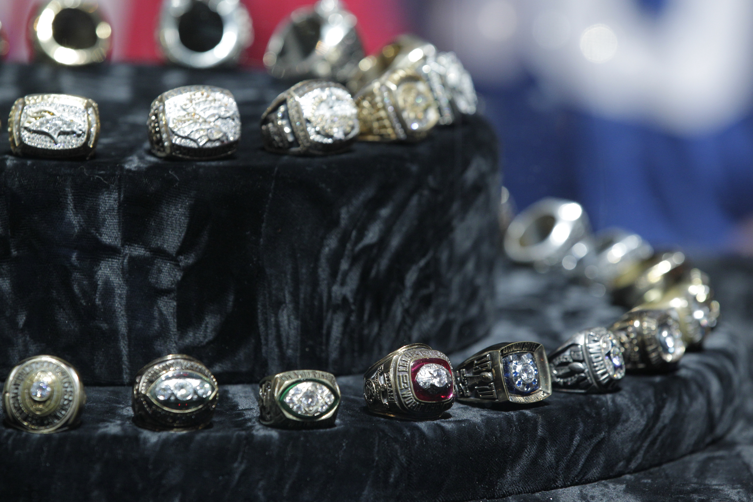 Past Super Bowl rings on display in 2012 (NBC / Getty Images)