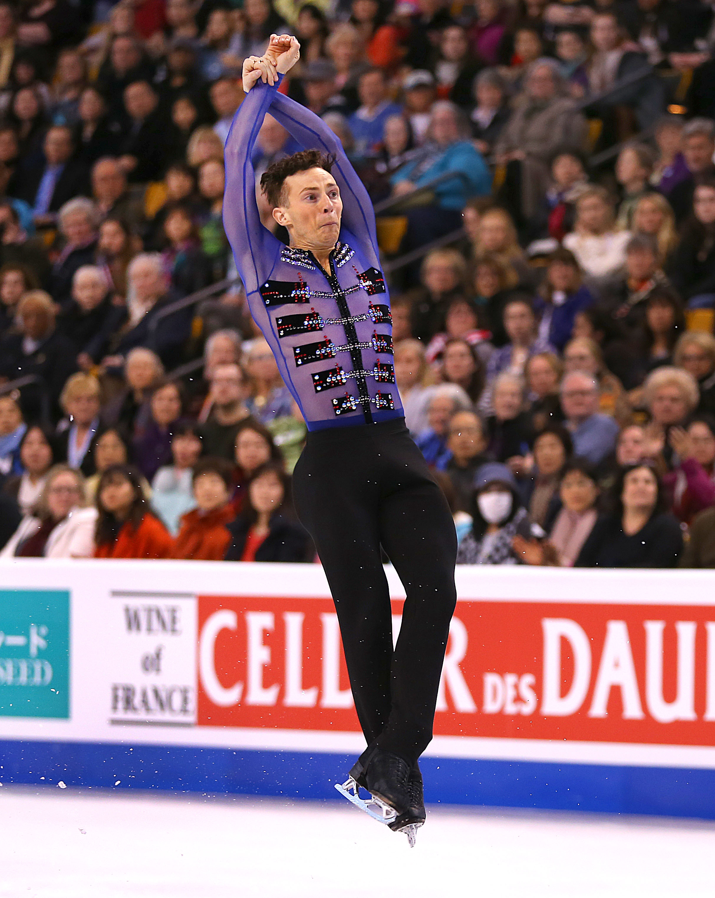 Adam Rippon from the United States jumps during the Mens Free Skate Program competition of the World Figure Skating Championships at TD Garden in Boston on April 1, 2016. (Boston Globe—Boston Globe via Getty Images)