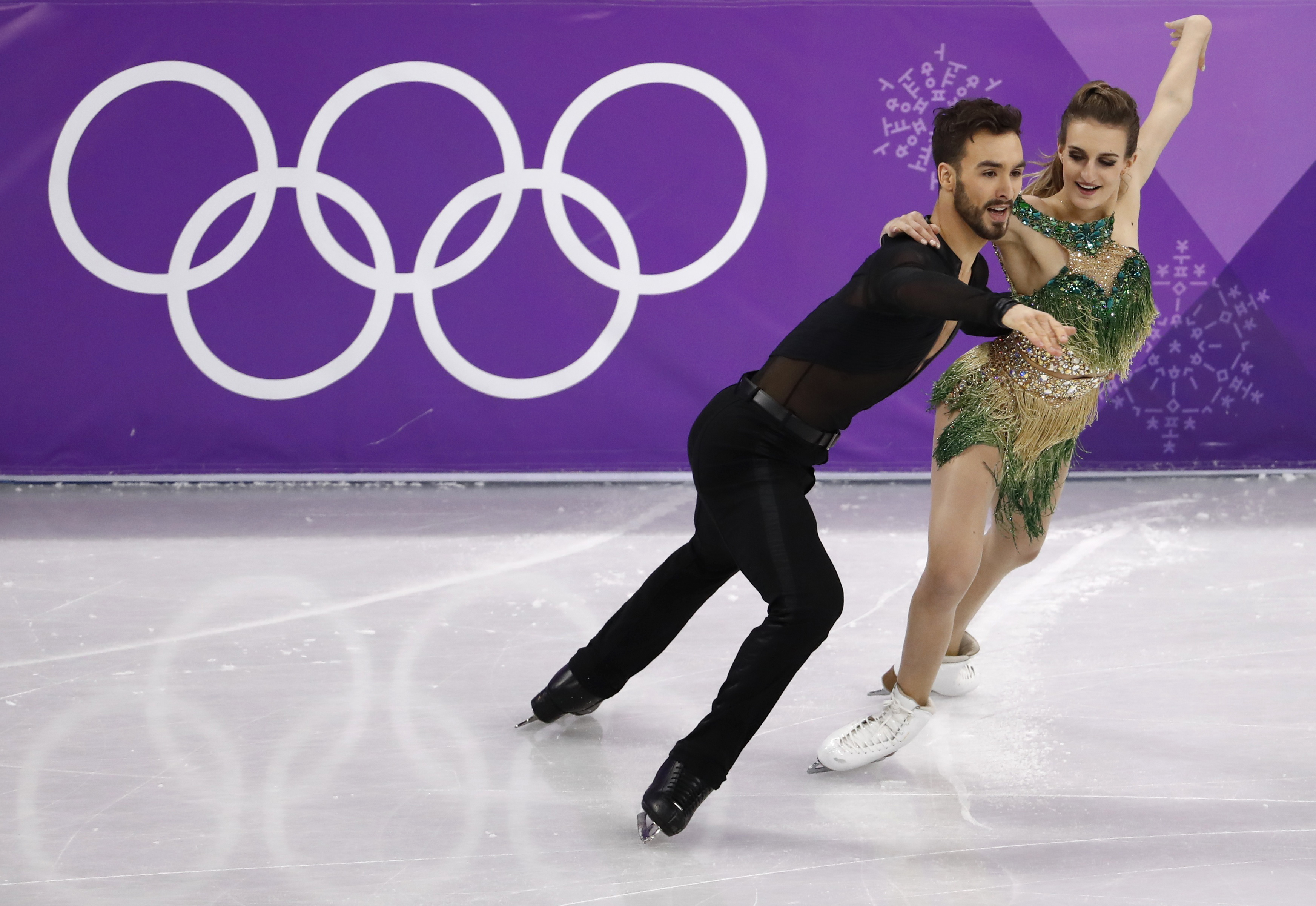 Guillaume Cizeron and Gabriella Papadakis of France perform in the 
                      Pyeongchang 2018 Winter Olympics at the Gangneung Ice Arena in Gangneung, South Korea on February 19, 2018. (Damir Sagolj—Reuters)