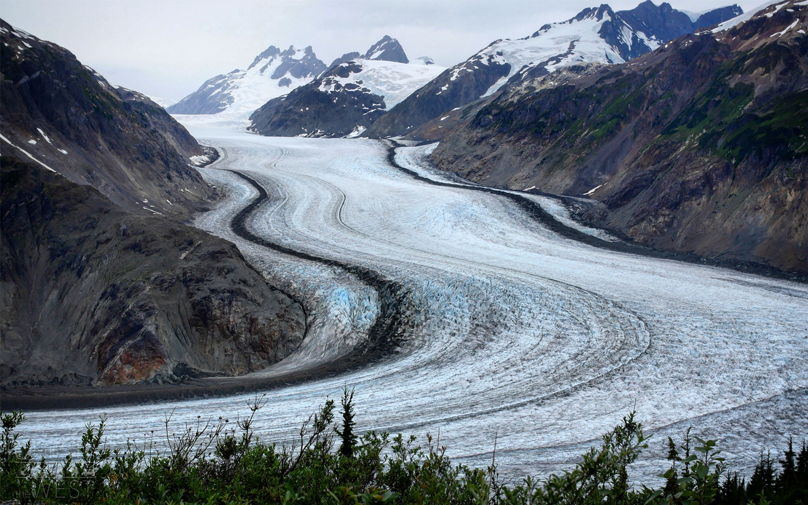In western British Columbia, the couple explored massive glaciers like Salmon Glacier, Canada's fifth largest glacier and the world's largest glacier accessible by road.
                              Thanks to its massive scale, those who visit the glacier, which sits north of both Stewart in British Columbia and Hyder, Alaska on the Canada-U.S. border, are rewarded with a striking view.
                              “When you get to the end of the road, you look down and there’s a massive glacier ahead of you, but the scale of it is so huge that you don’t even realize the crevices on it until you start to look closer,” Paquette said.