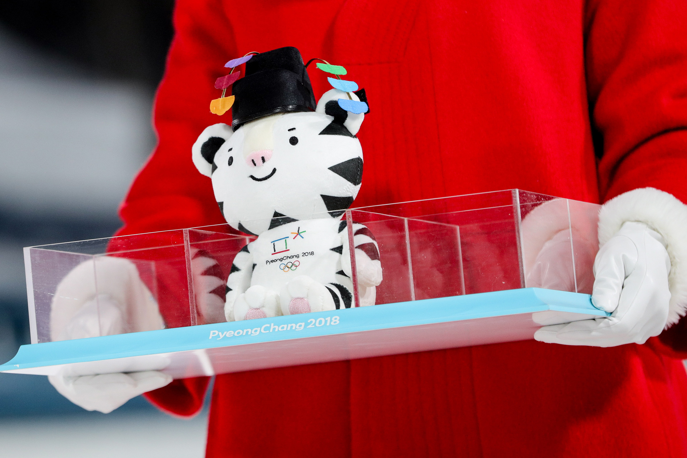A plush toy of the PyeongChang 2018 Winter Olympic Games mascot Soohorang at a flower ceremony for the ladies' cross-country skiing individual sprint classic event during the 2018 Winter Olympic Games, at the Alpensia Cross-Country Skiing Centre (Sergei Bobylev—TASS/Getty Images)