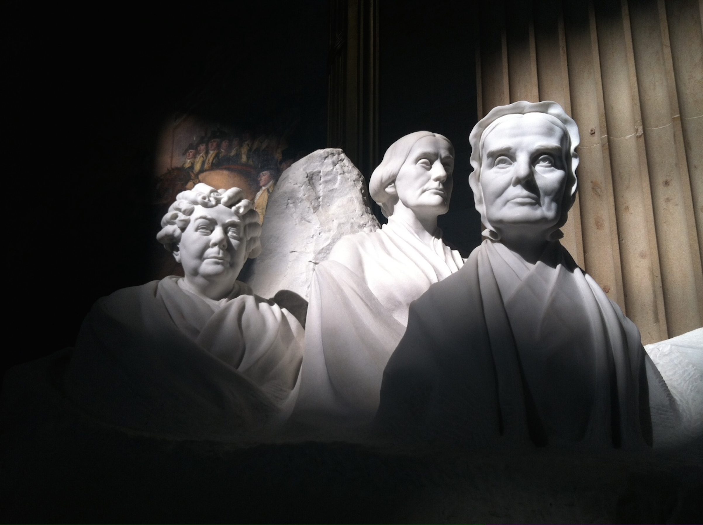 Statues of US  pioneers for women's suffrage,  Elizabeth Cady Stanton (L), Susan B. Anthony (C), and Lucretia Mott (R) are seen Sept. 30, 2013 in the US Capitol Rotunda in Washington, DC. (Michael Mathes—AFP/Getty Images)