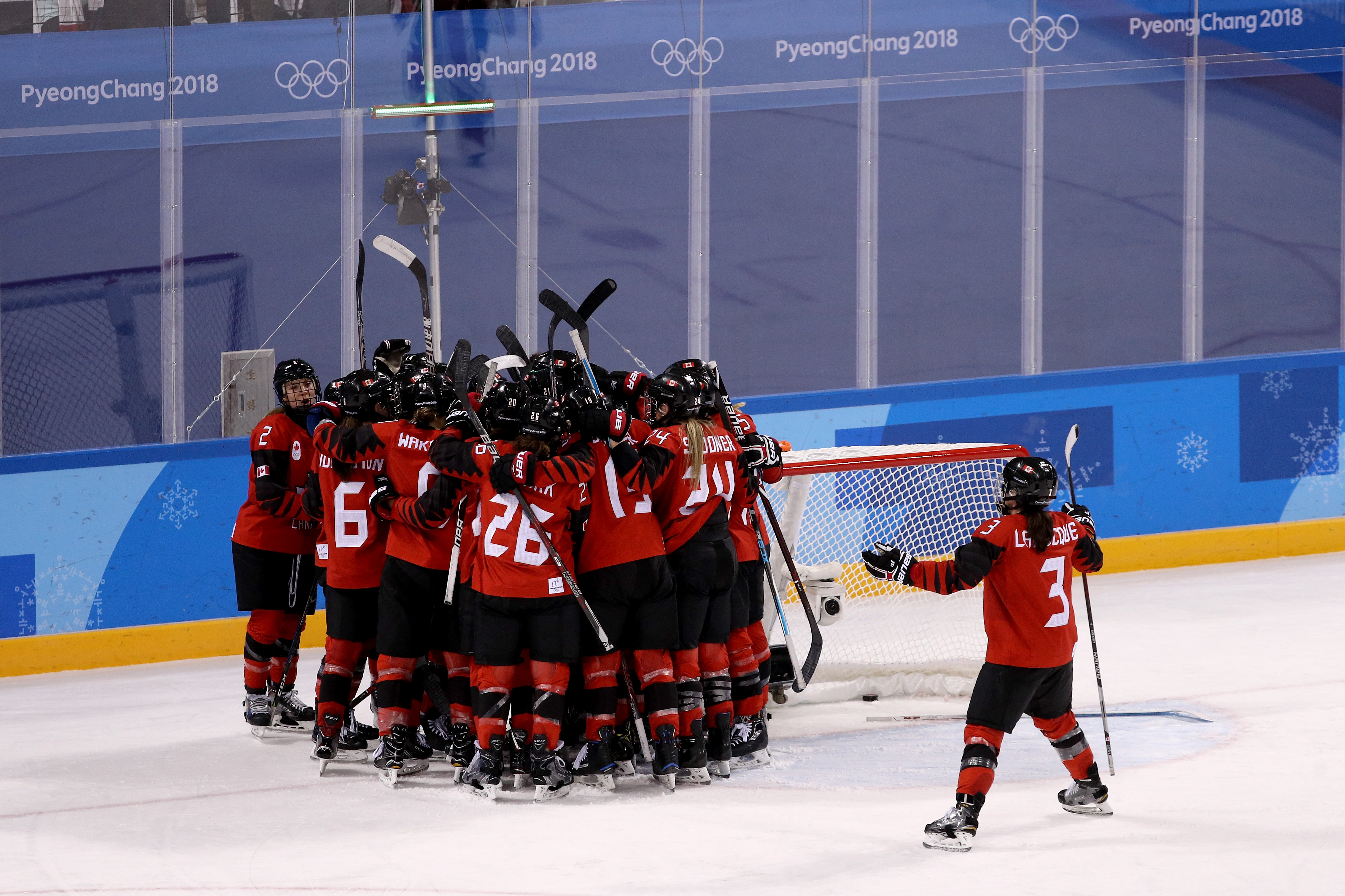 Canada celebrates after defeating the United States 2-1 during the Women's Ice Hockey Preliminary Round Group A game on day six of the PyeongChang 2018 Winter Olympic Games at Kwandong Hockey Centre on February 15, 2018 in Gangneung, South Korea. (Maddie Meyer—Getty Images)
