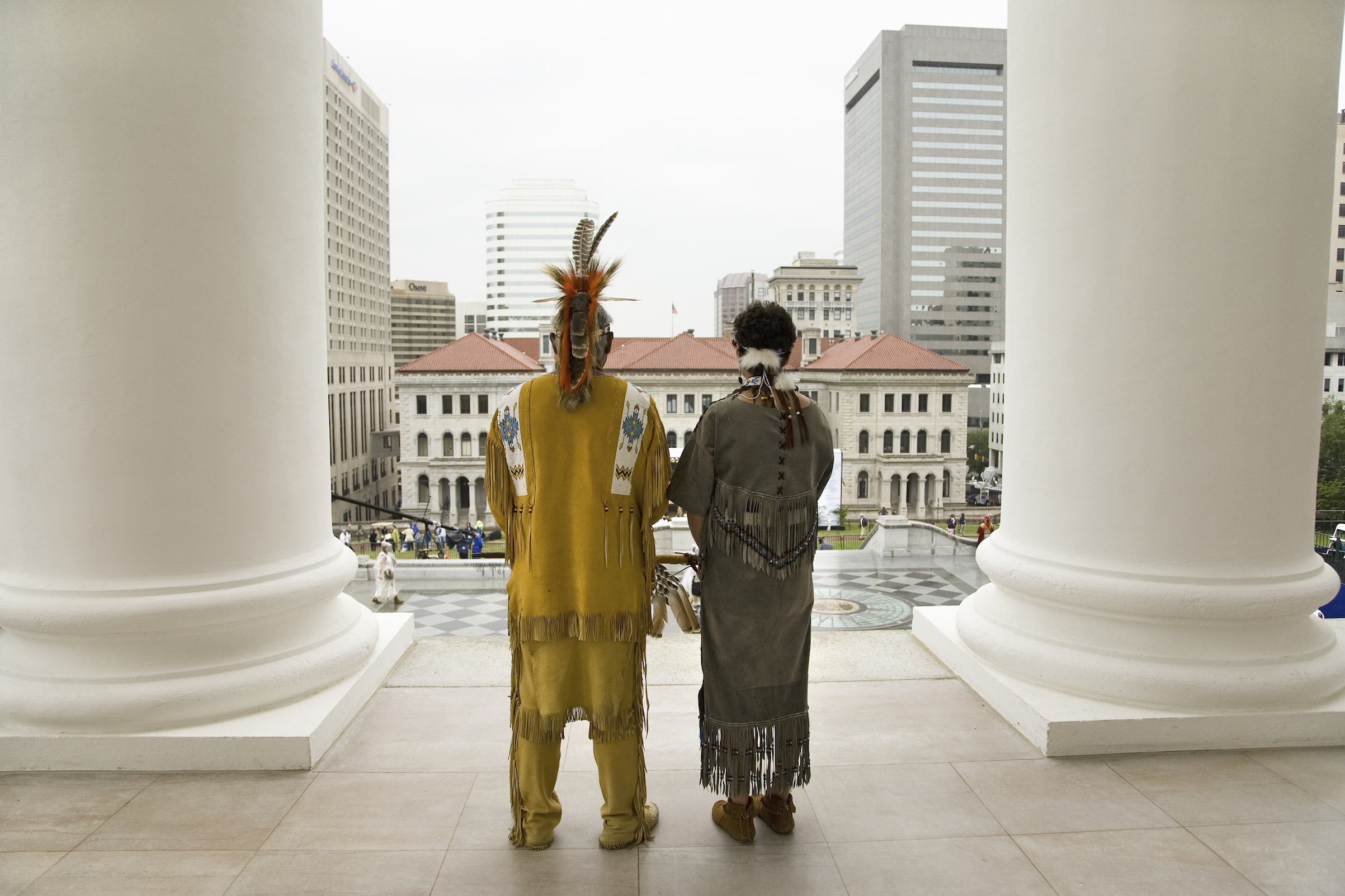 Two Powhatan Tribal members looking over Richmond, Va., from the State Capitol during ceremonies for the 400th Anniversary of the Jamestown Settlement on May 3, 2007. (Joseph Sohm—UIG via Getty Images)