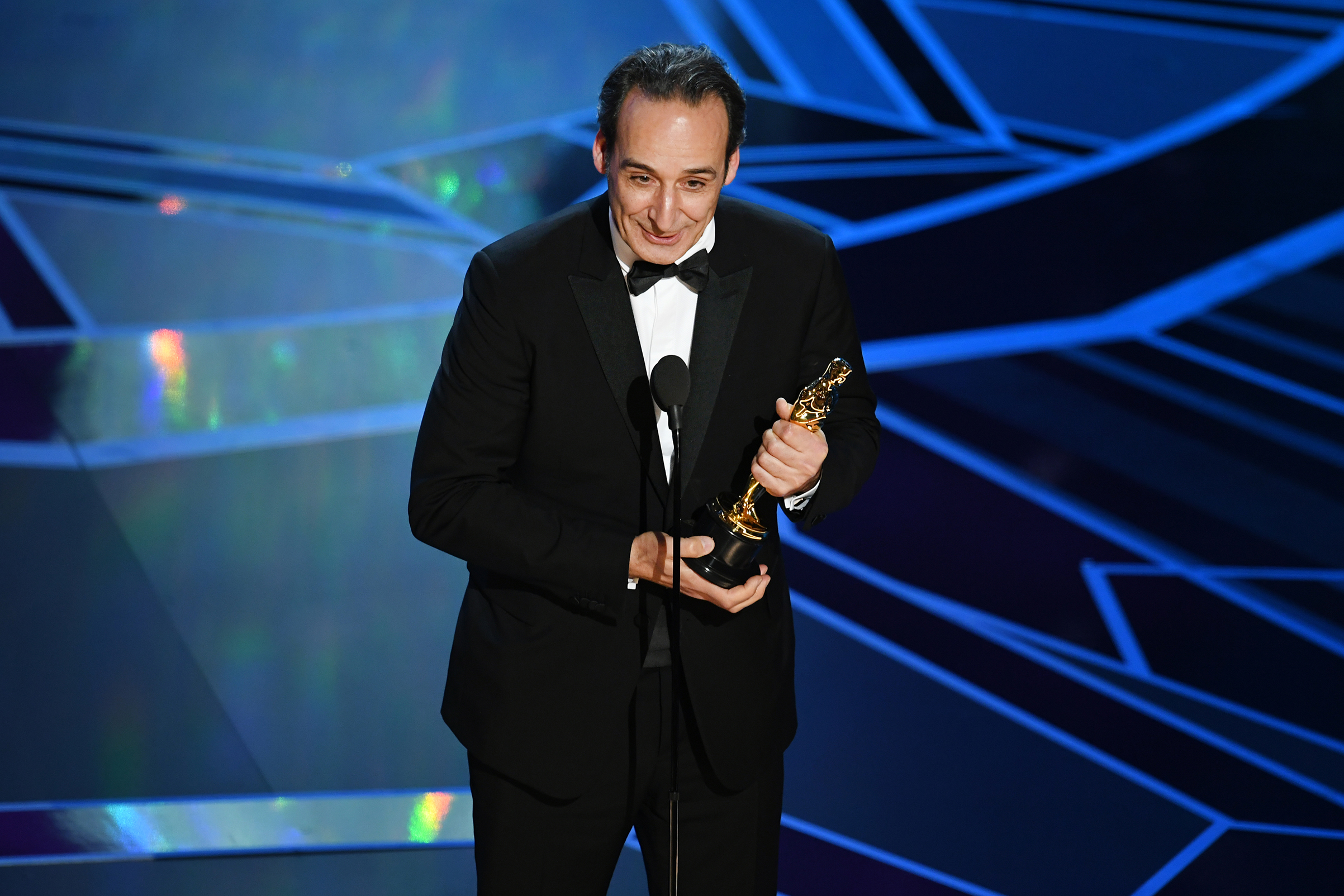 Composer Alexandre Desplat accepts Best Original Score for 'The Shape of Water' onstage during the 90th Annual Academy Awards at the Dolby Theatre at Hollywood &amp; Highland Center on March 4, 2018 in Hollywood. (Kevin Winter—Getty Images)