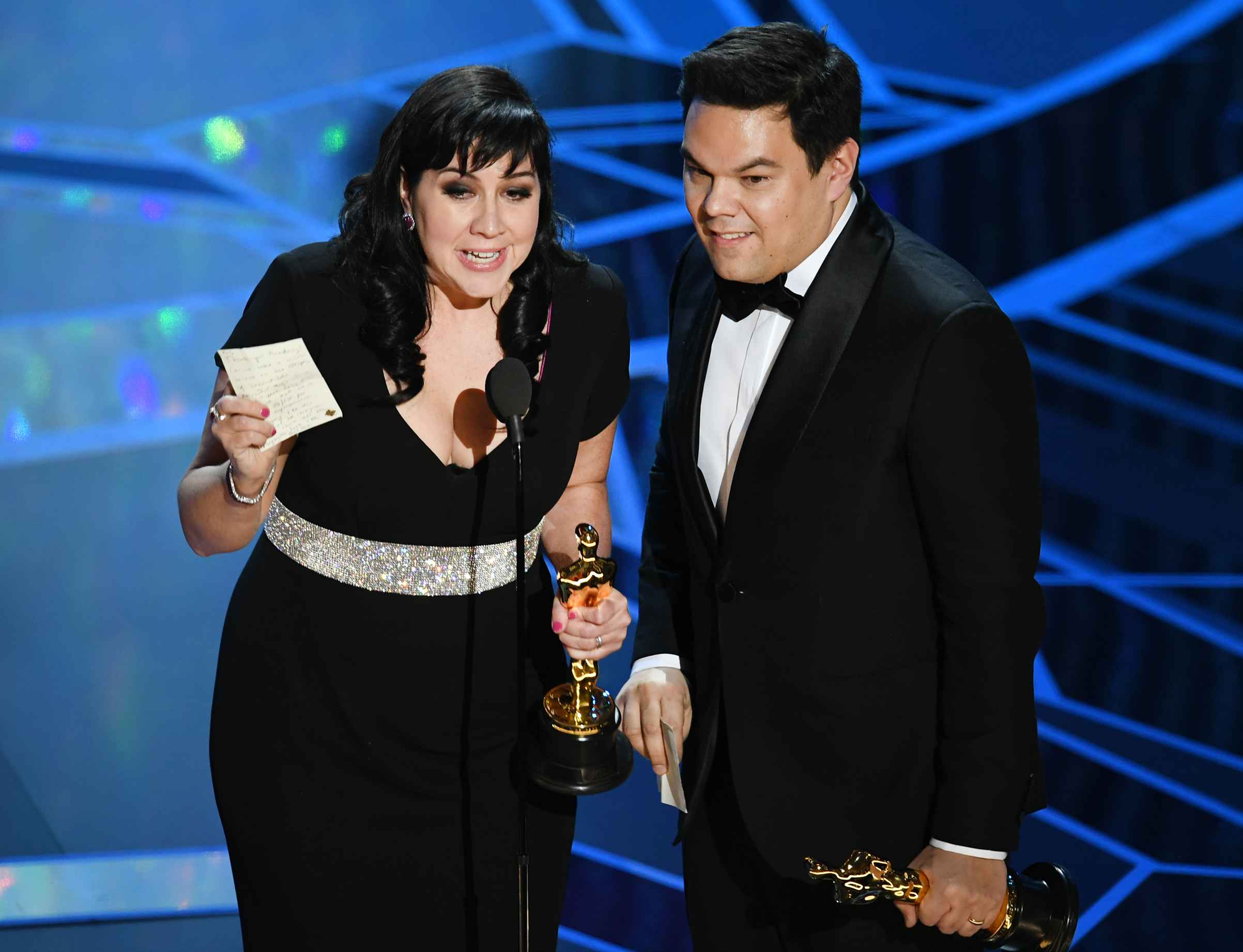 Songwriters Kristen Anderson-Lopez and Robert Lopez accept Best Original Song for 'Remember Me' from 'Coco' onstage during the 90th Annual Academy Awards at the Dolby Theatre at Hollywood &amp; Highland Center on March 4, 2018 in Hollywood. (Kevin Winter—Getty Images)