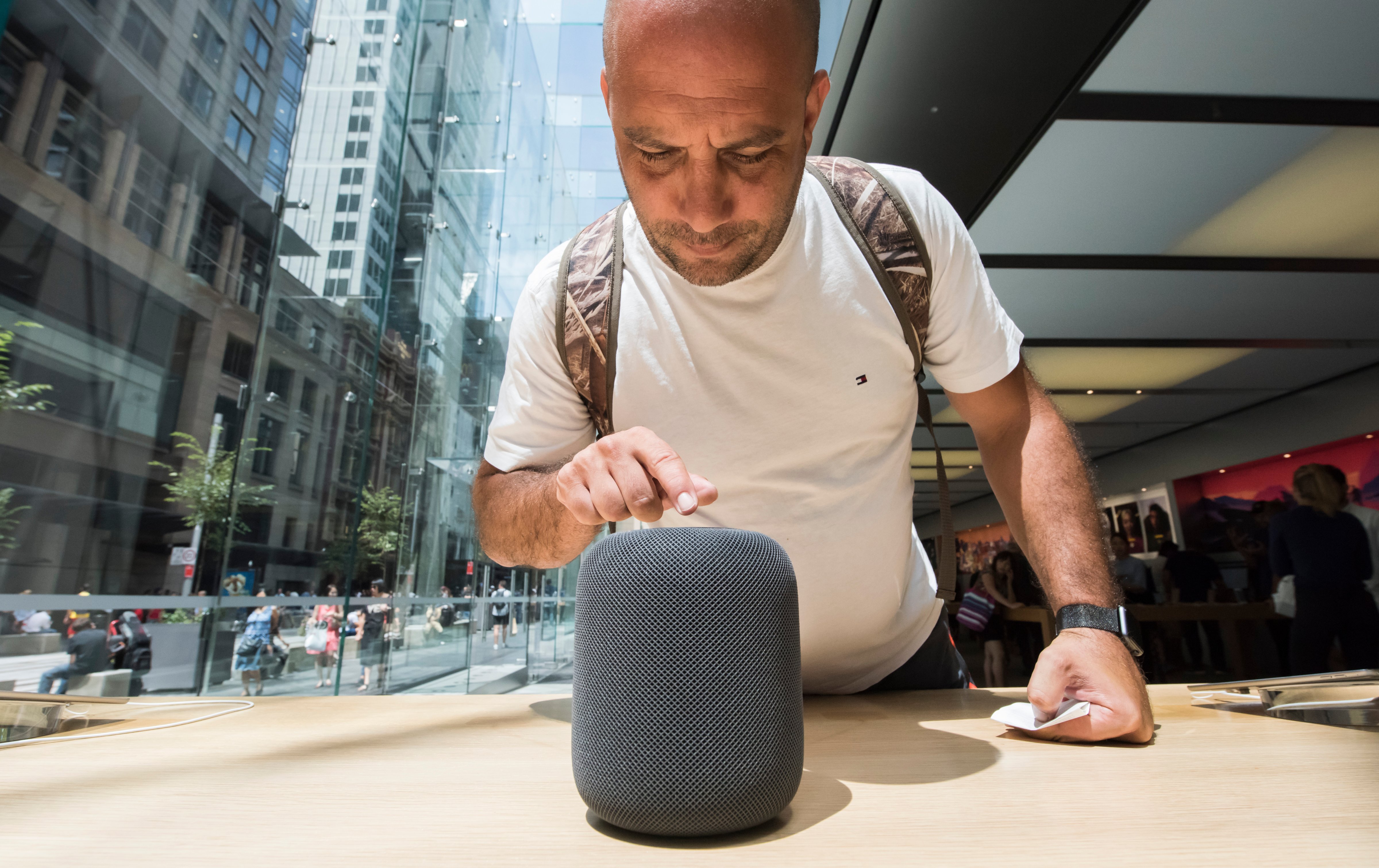 Customers interacting with the new product at the launch of the HomePod at the Apple Store on February 9, 2018 in Sydney, Australia. (James D. Morgan—Getty Images)