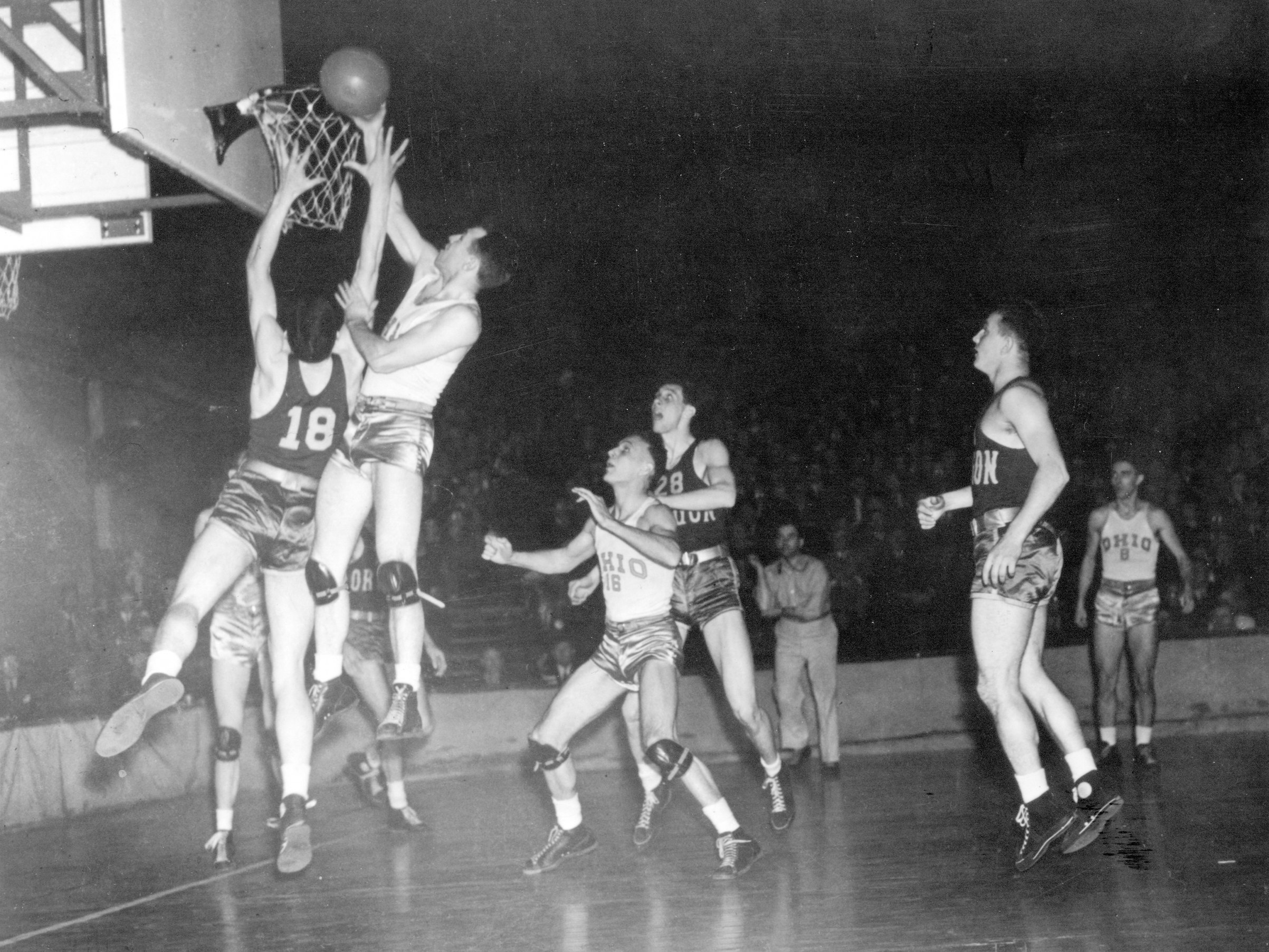 John Schick makes a basket during the first NCAA Men's Basketball National Championship game held in Evanston, Ill., on Mar. 27, 1939. (NCAA Photos/Getty Images)