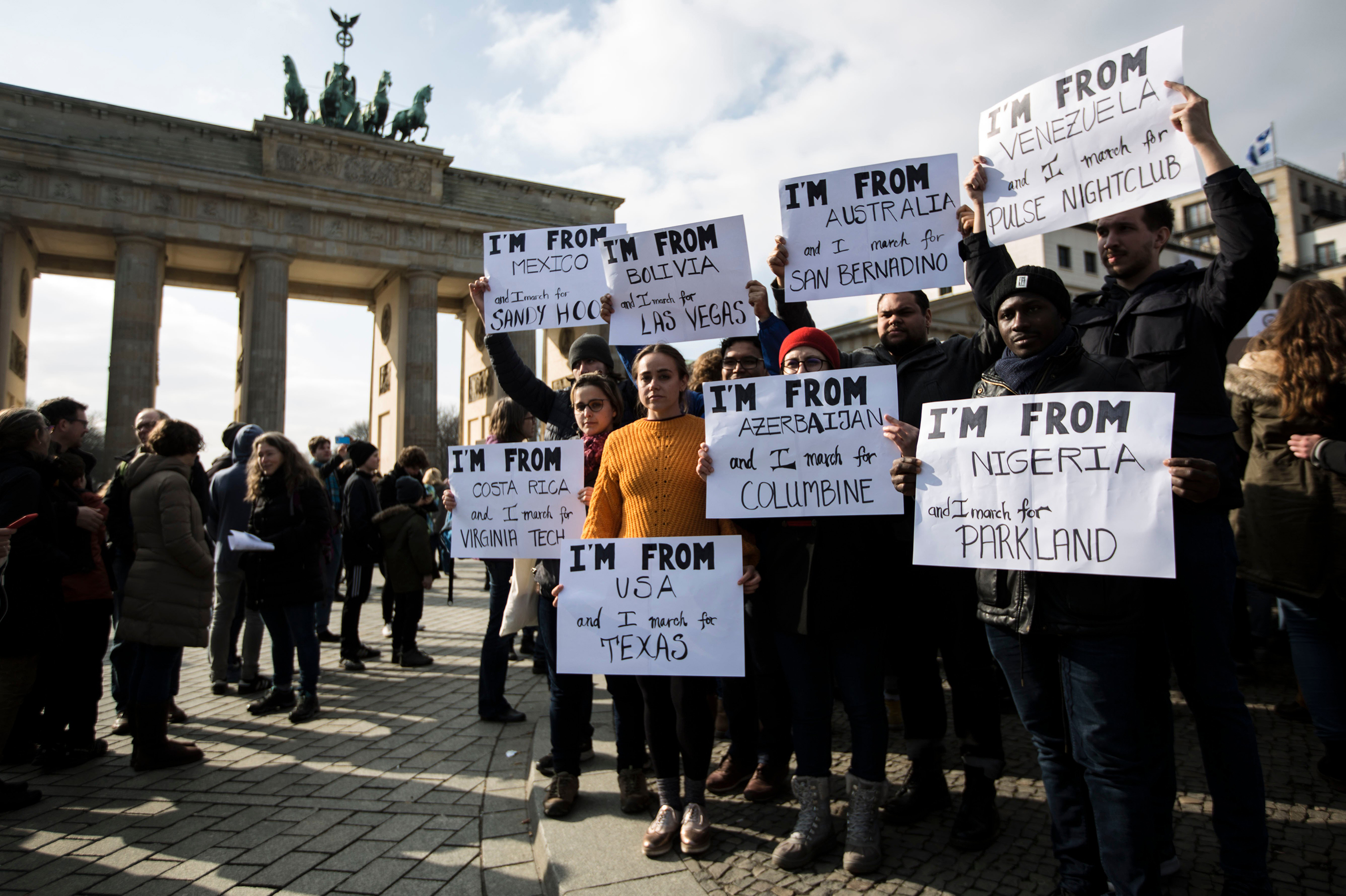 About 500 people gathered at Brandenburg Gate in the German capital to honor the victims of the Parkland massacre and call for stronger gun control in the United States. (Omer Messinger—EPA-EFE/Shutterstock)