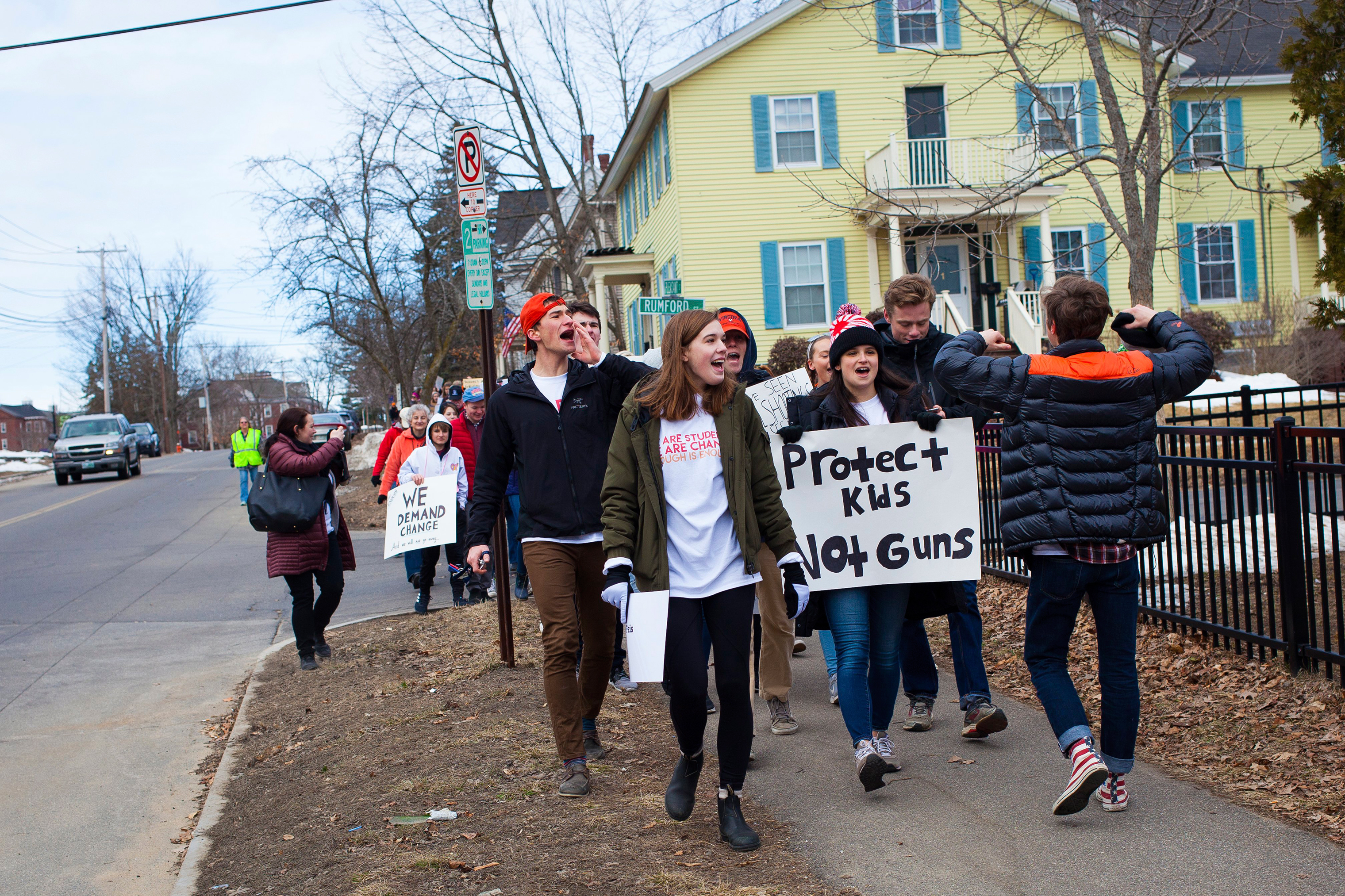 Protesters march to the State House in downtown Concord. (Elizabeth Frantz—The Concord Monitor/AP)
