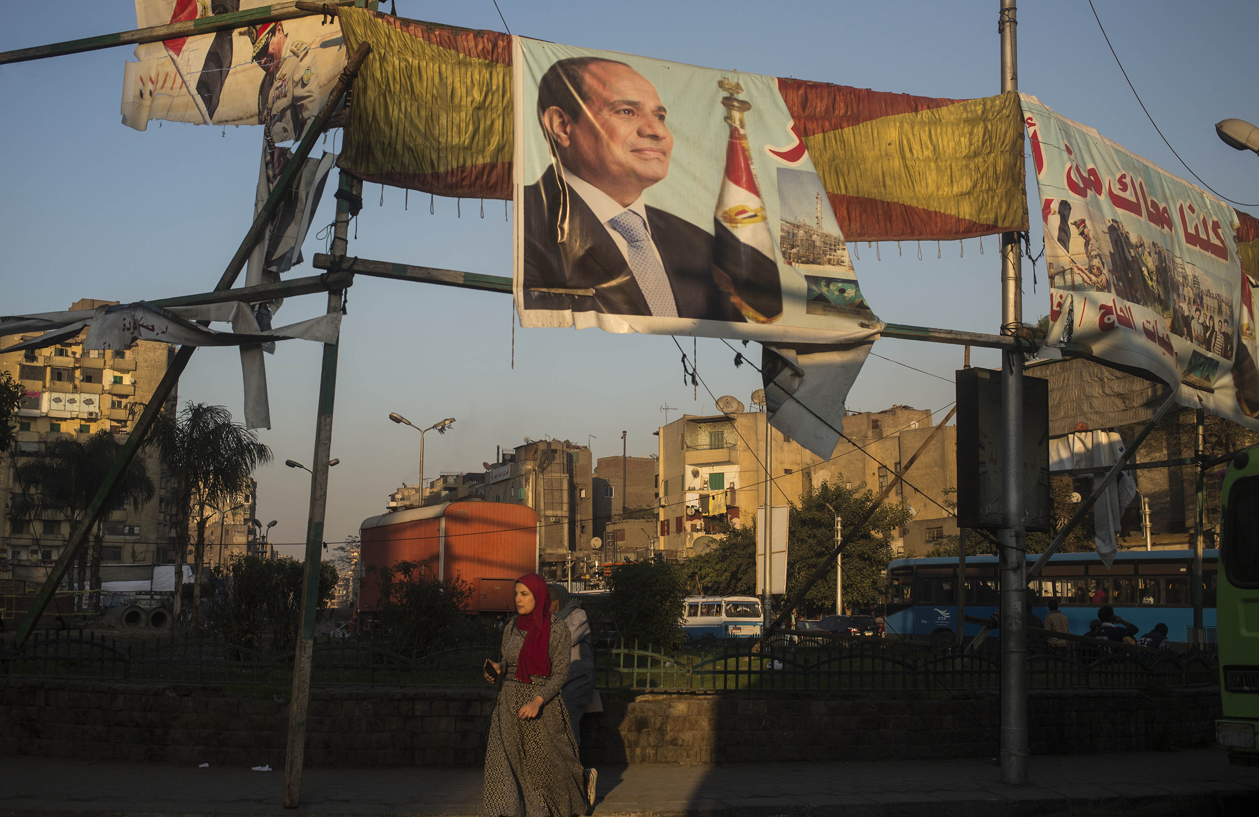 Genuine opposition candidates to Egyptian President Abdul Fattah al-Sisi, on poster above, have either been arrested or intimidated into dropping out (Asmaa Waguih—Redux)