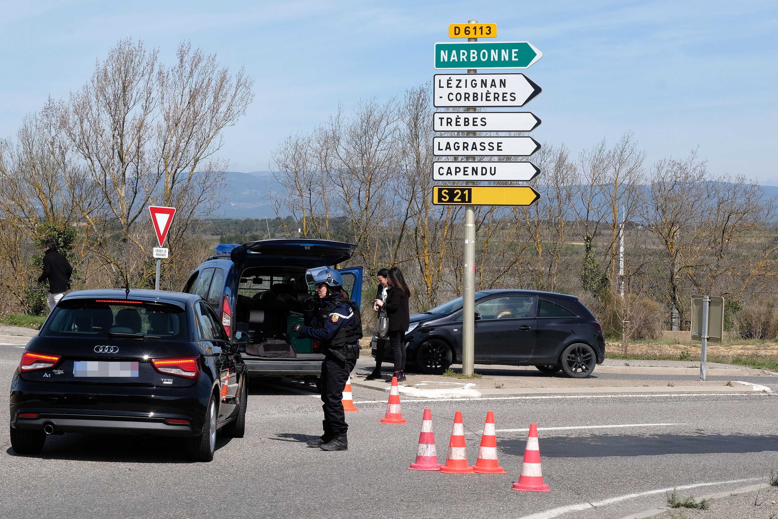 French gendarmes block the access to Trebes, where a man took hostages at a supermarket on March 23, 2018 in Trebes, southwest France. At least one person was feared dead after a gunman claiming allegiance to the Islamic State group fired shots in a hostage-taking at a supermarket in southwest France, police said. / AFP PHOTO / ERIC CABANIS (ERIC CABANIS&mdash;AFP/Getty Images)