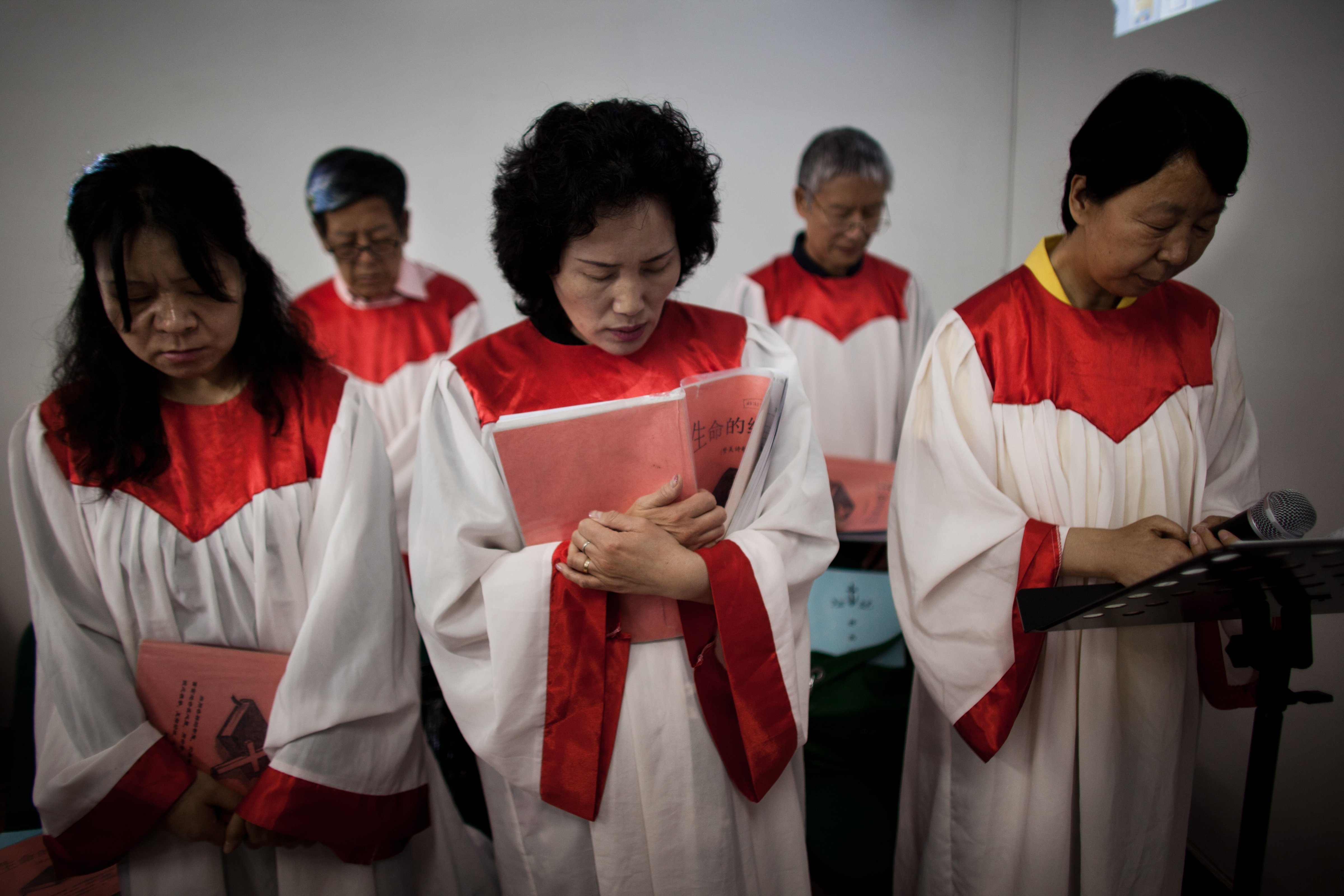 Members of a house church meet for Sunday service May 15, 2011 in Beijing, China. (Jonathan Saruk—Getty Images)