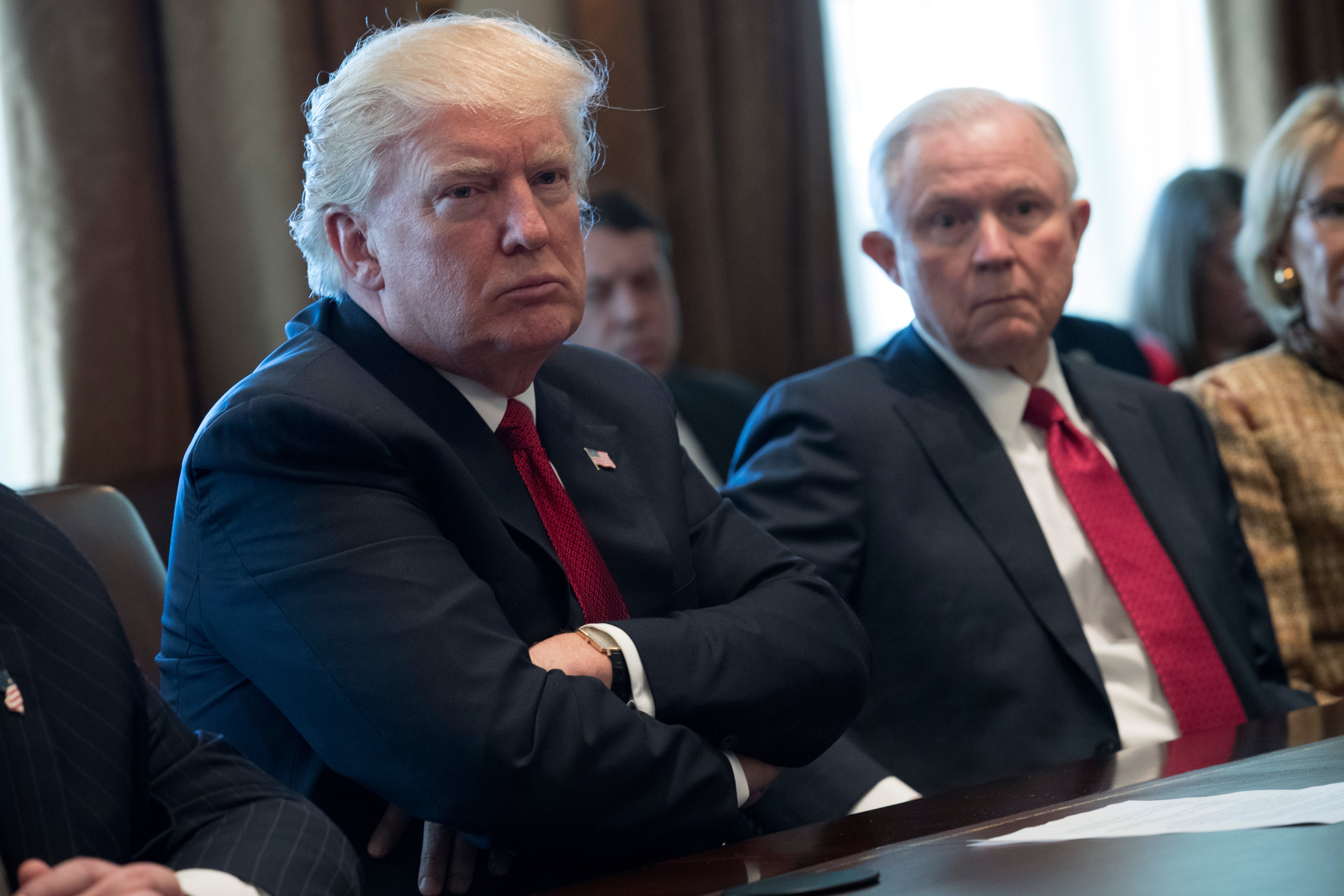 U.S. President Donald Trump (L) and Attorney General Jeff Sessions (R) attend a panel discussion on an opioid and drug abuse in the Roosevelt Room of the White House March 29, 2017 in Washington, DC. (Photo by Shawn Thew-Pool/Getty Images) (Pool&mdash;Getty Images)