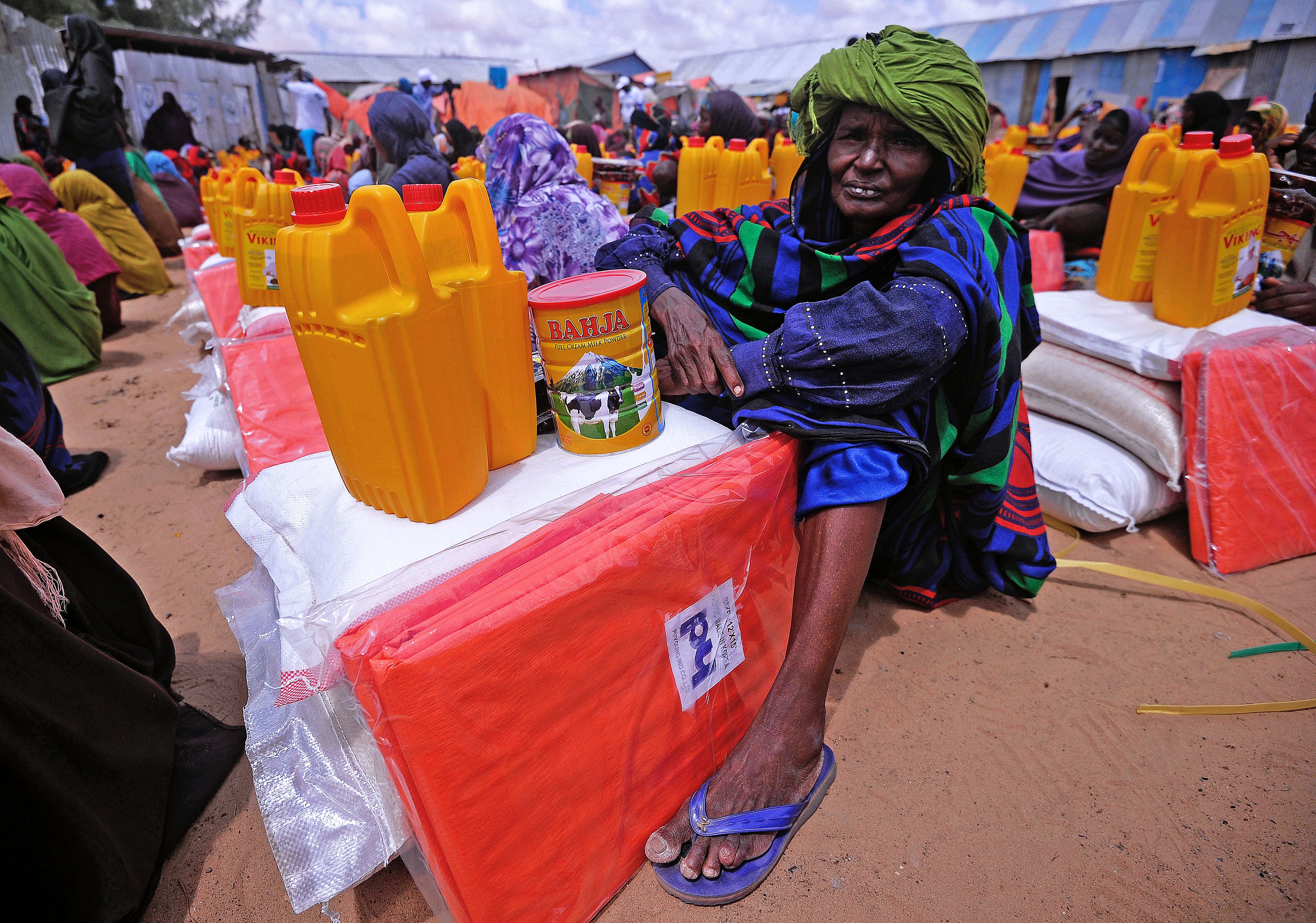 A Somali woman displaced by drought waits for food and water at an aid distribution centre outside Mogadishu on April 6, 2017. (Mohamed Abdiwahab—AFP/Getty Images)