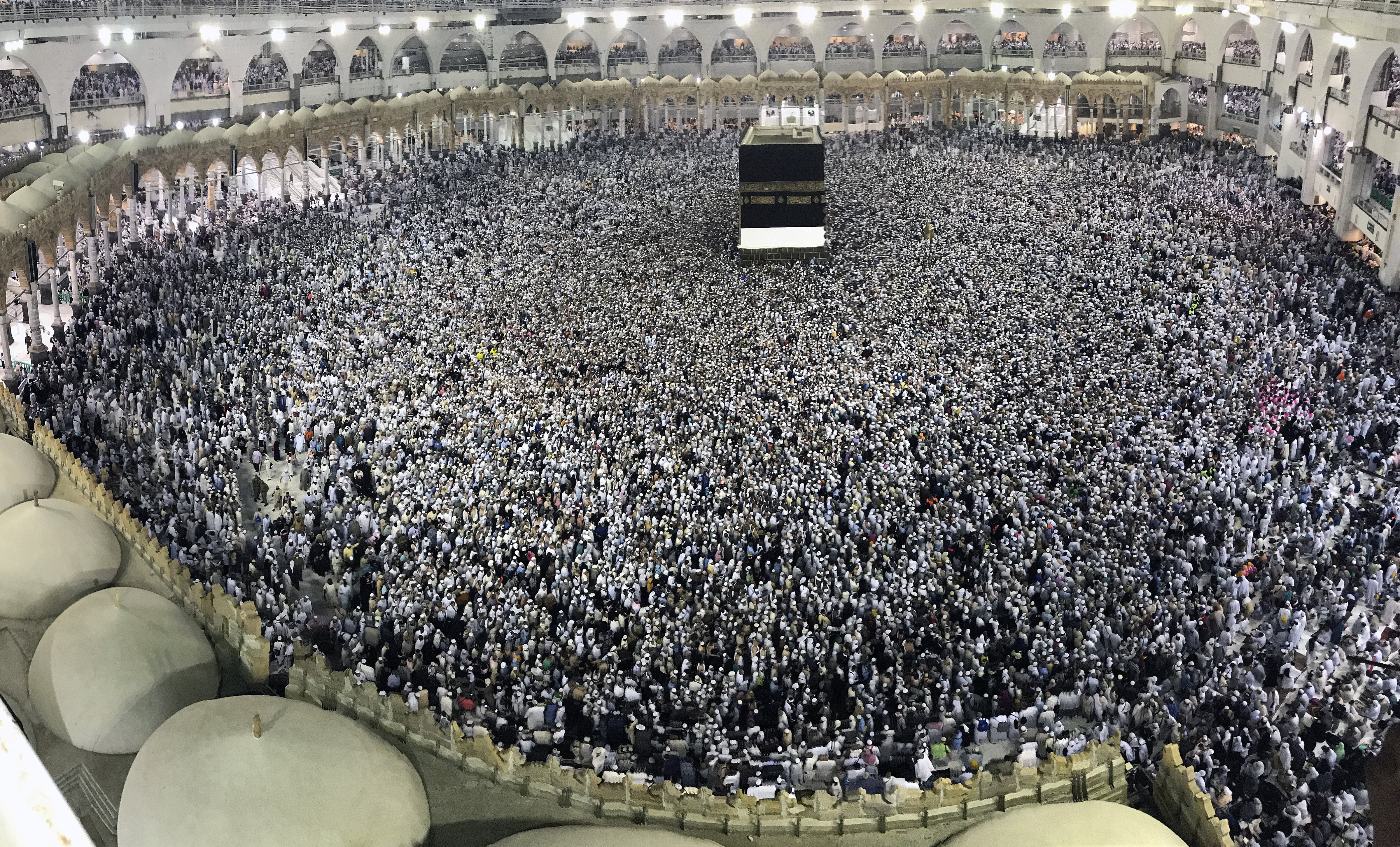 Hajj pilgrims circumambulate around the Kaaba, Islam's holiest site, located in the center of the Masjid al-Haram (Grand Mosque) in Mecca, Saudi Arabia on Aug. 22, 2017. (Firat Yurdakul—Anadolu Agency/Getty Images)