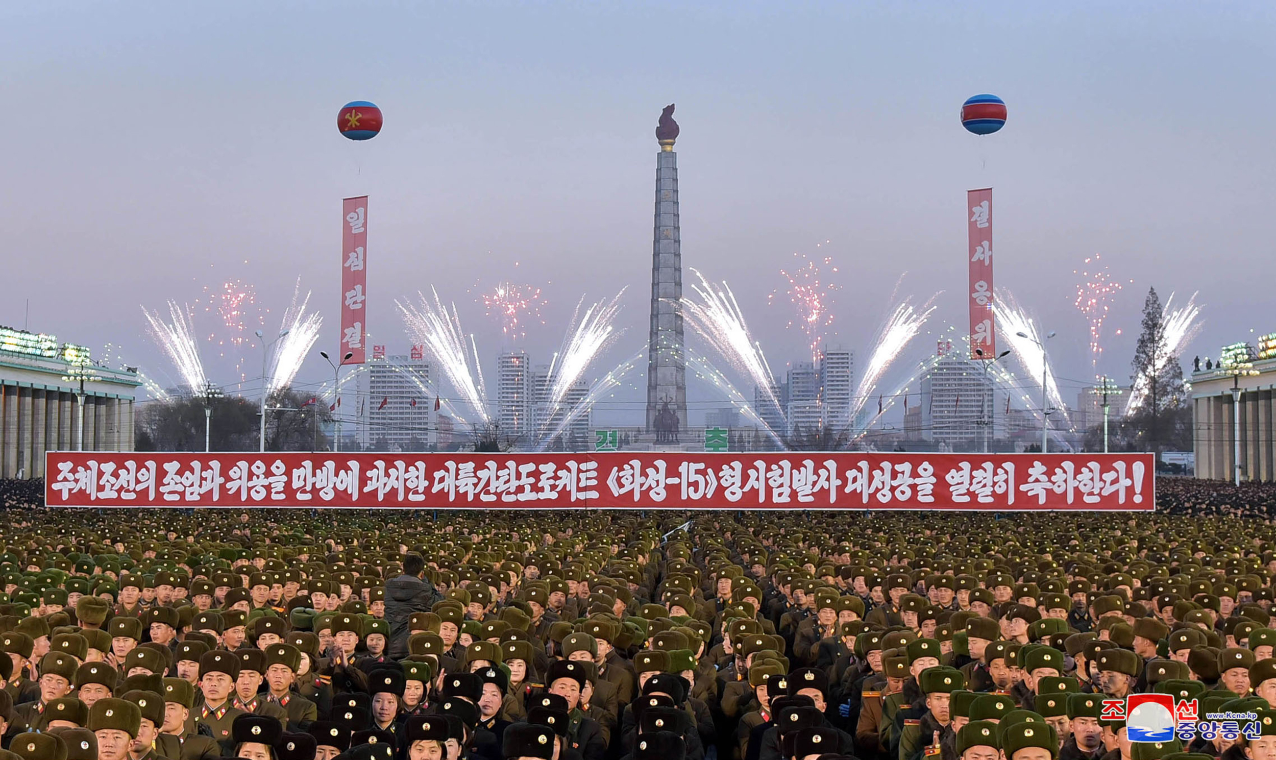This picture released by North Korea's official Korean Central News Agency on Dec. 2, 2017 shows North Korean soldiers and residents holding a rally in Pyongyang. (AFP/Getty Images)