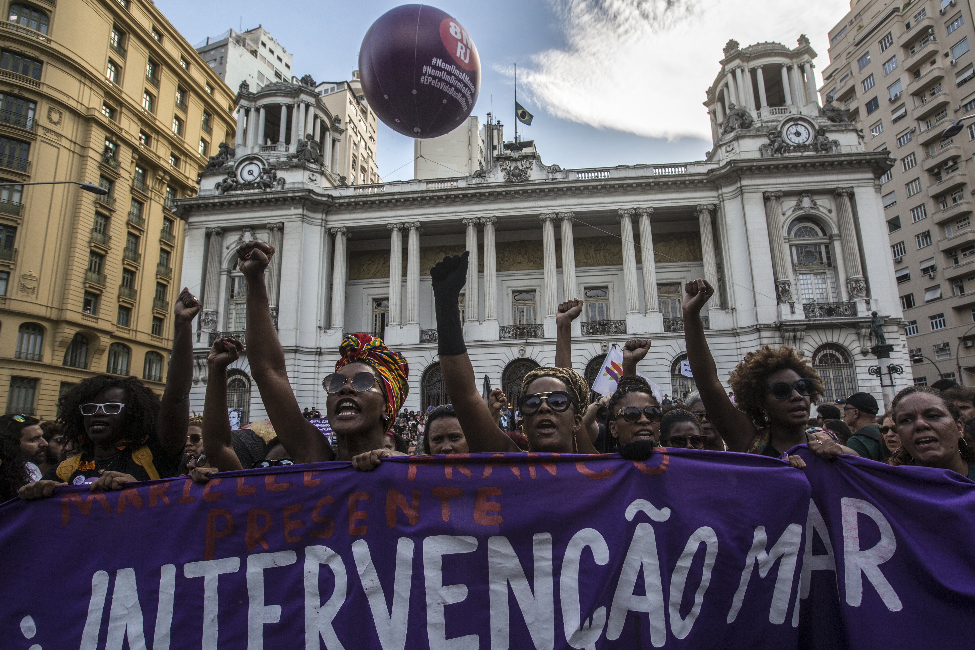 Supporters rally following the murder of councilwoman Marielle Franco in Rio de Janeiro, Brazil, on March 15, 2018. Franco, a 38 year-old black politician from one of Rio's poorest and most violent communities, killed late on March 14 in a shooting that many feared to be a targeted assassination. (Dado Galdieri—Bloomberg/Getty Images)