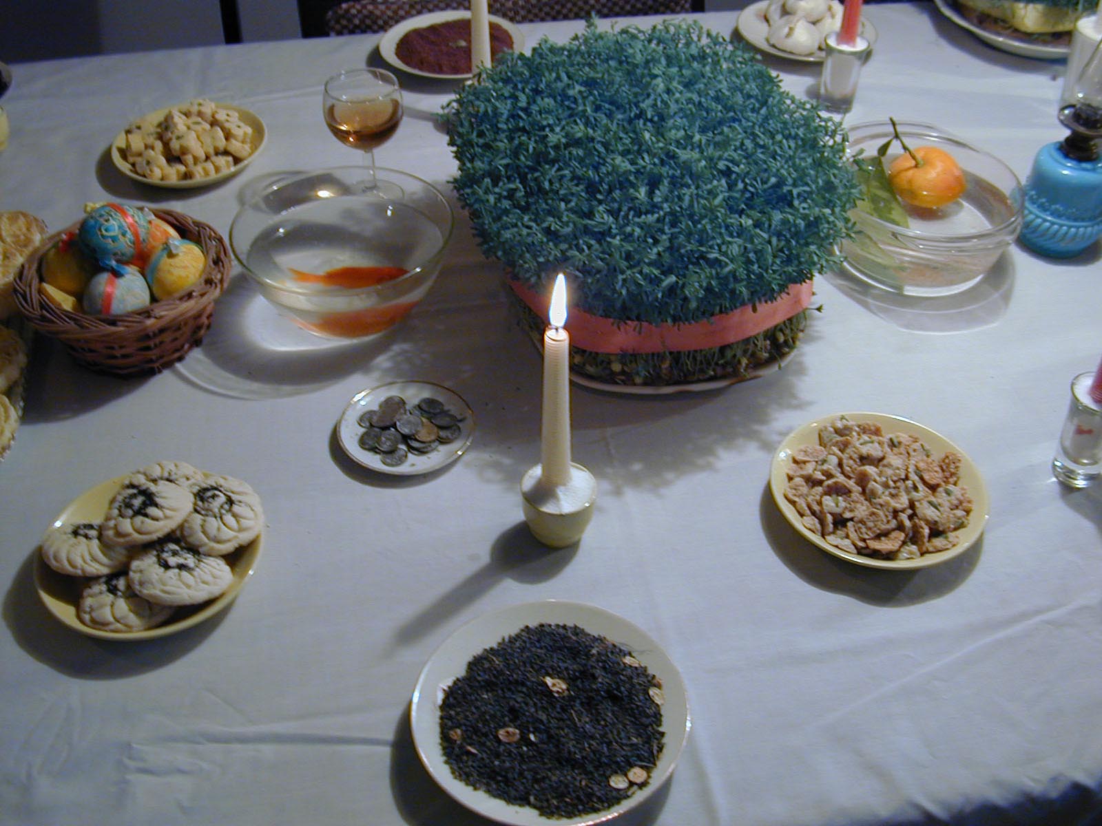 A Haft-Sin table furnished with the traditional seven symbolic items, each beginning with the Persian letter S (Sin), Tehran, Iran, 21st March 2002. Haft-Sin is a tradition associated with Iranian new year (Nowruz) celebrations. (Photo by Kaveh Kazemi/Getty Images) (Kaveh Kazemi&mdash;Getty Images)