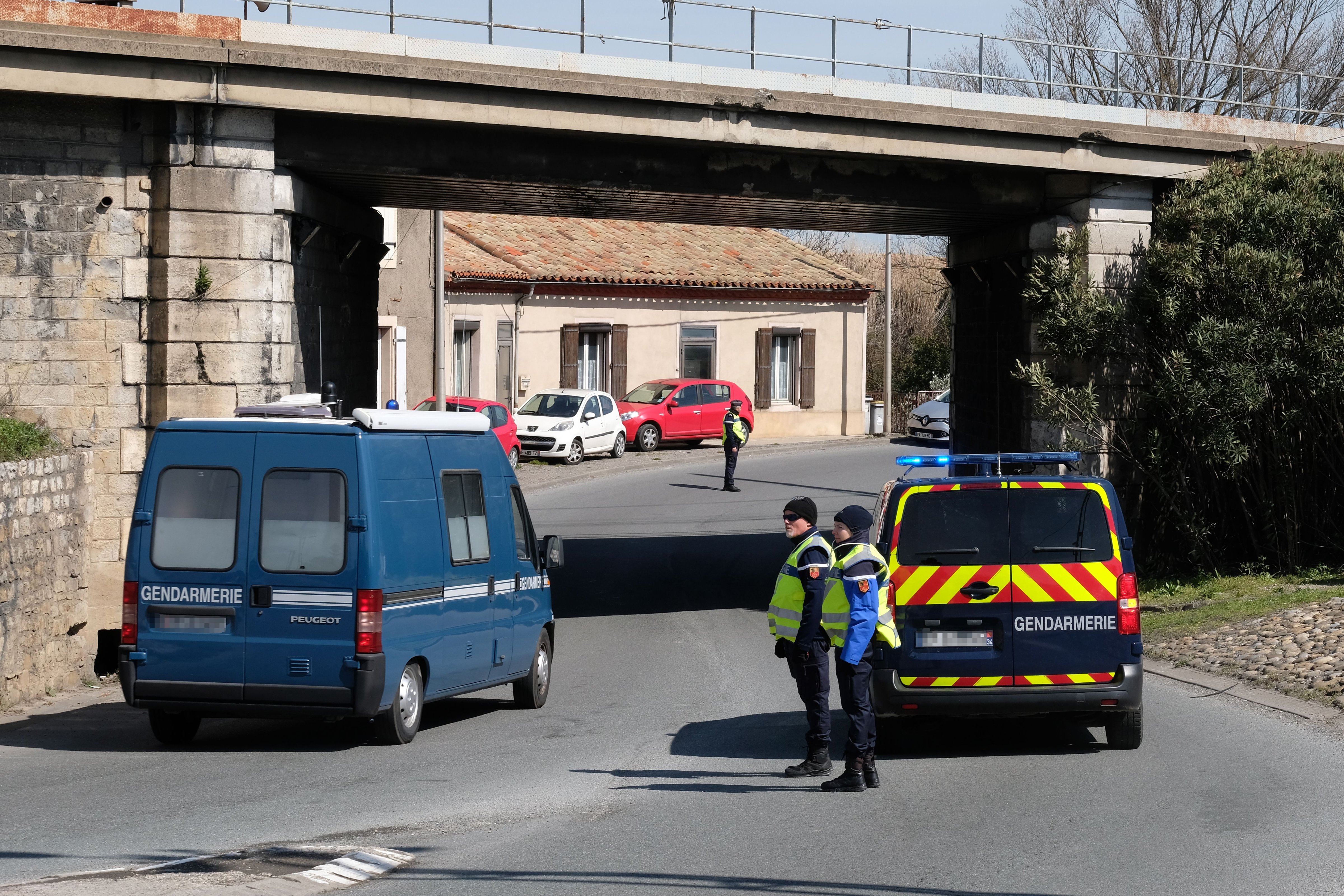 French gendarmes block an access to Trebes, where a man took hostages at a supermarket on March 23, 2018 in Trebes, southwest France. At least two people were killed after a gunman claiming allegiance to the Islamic State group opened fire and took hostages at a supermarket in southwest France. / AFP PHOTO / ERIC CABANIS (ERIC CABANIS&mdash;AFP/Getty Images)