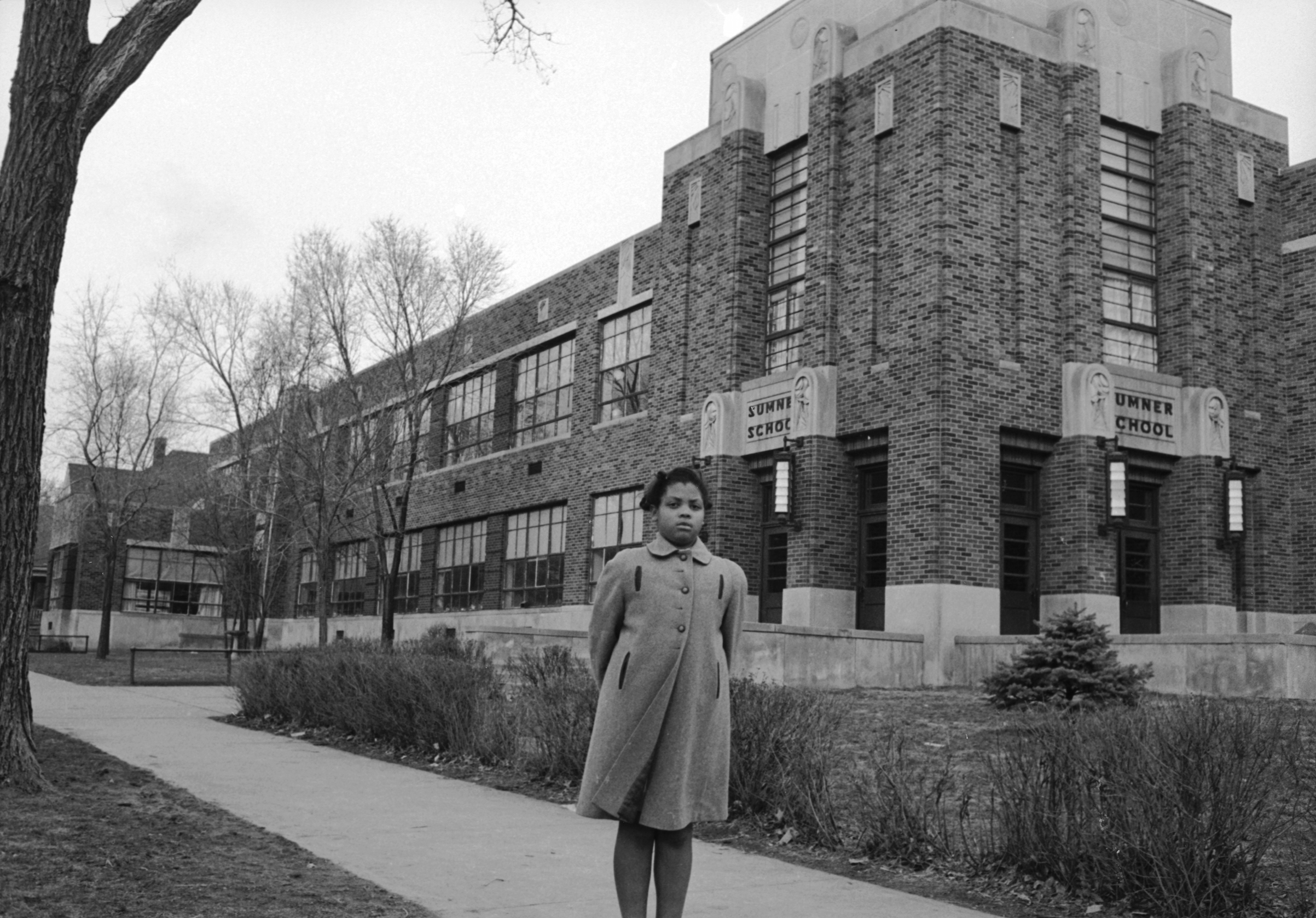 Portrait of Linda Brown at 9, outside Sumner Elementary School, Topkea, Kans., 1953. (Carl Iwasaki—The LIFE Images Collection/Getty Images)