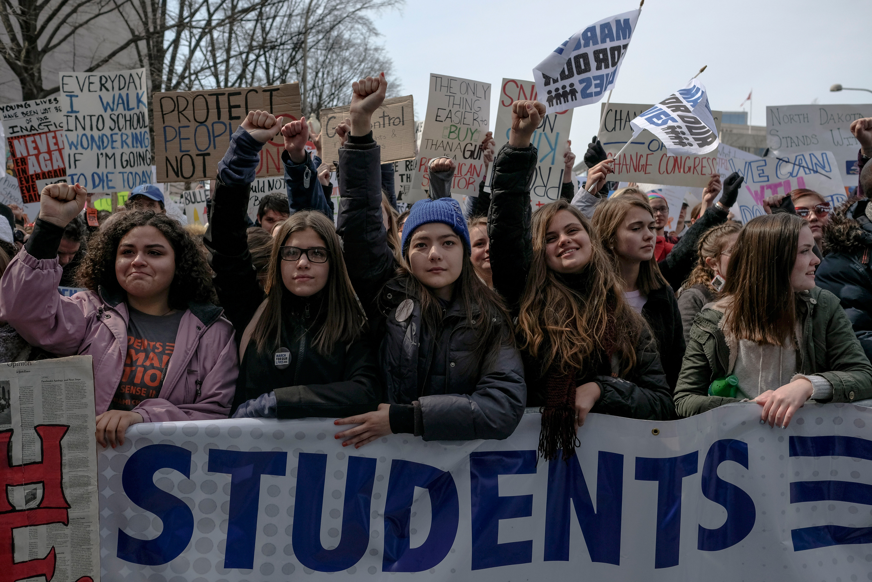 Stduents put their fits in the air in response to the Parkland students and #NeverAgain organizers. (Gabriella Demczuk for TIME)