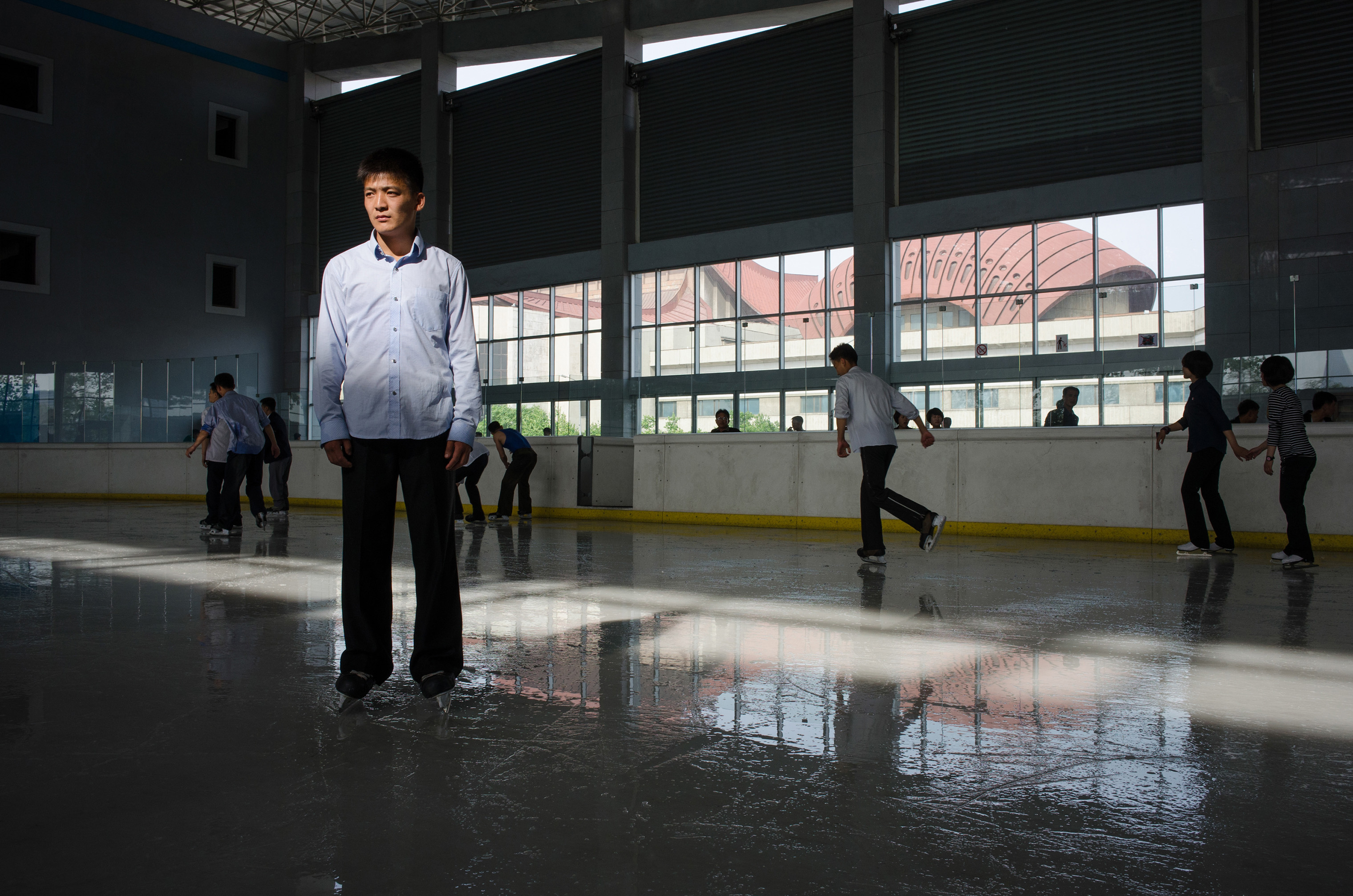 Ri Yong Min, 21, a boxing champion, at an outdoor ice rink in 2014. (Matjaž Tančič (Koryo studio))