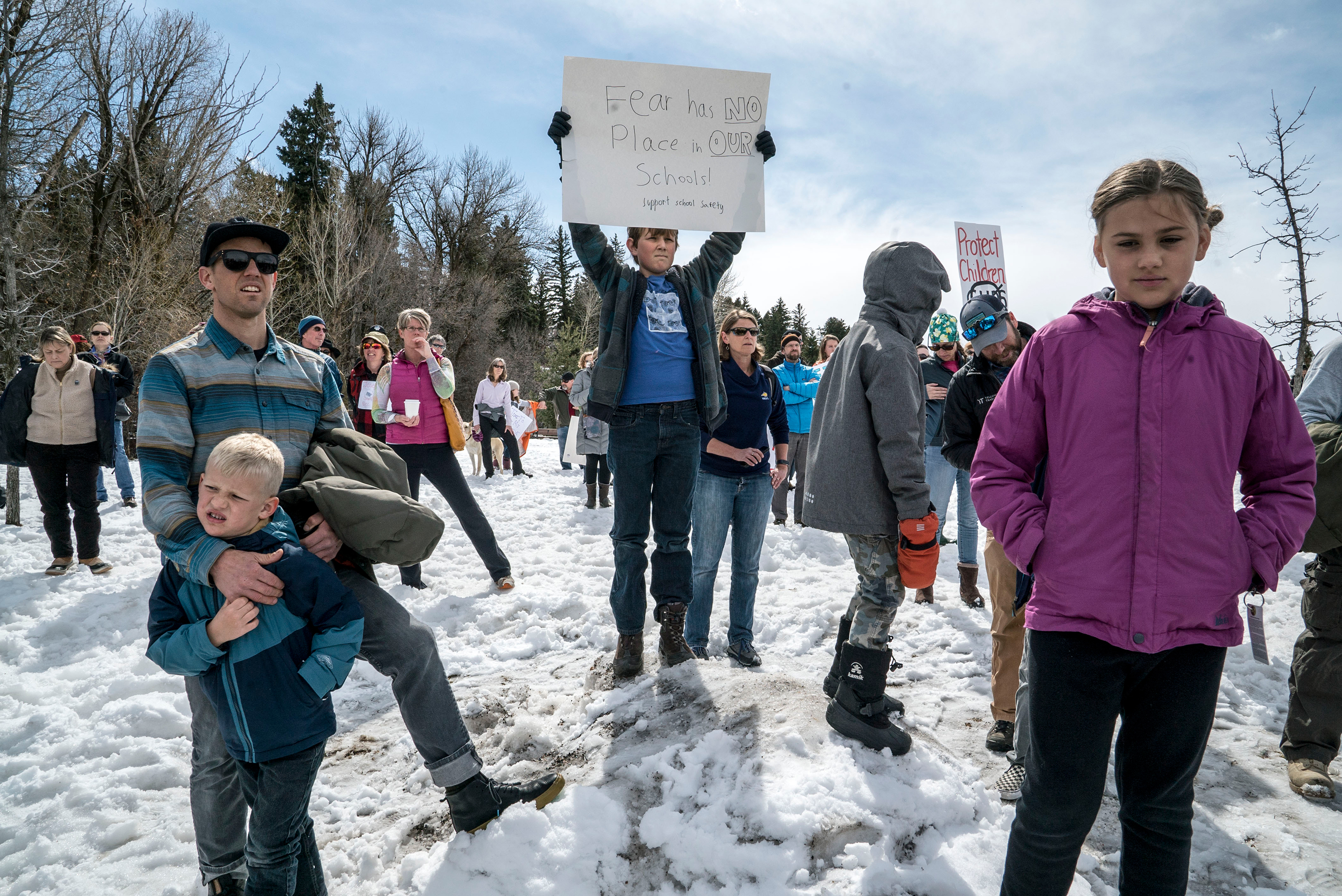 The march in Bozeman, Montana, began at the Gallatin County Courthouse and went to the lawn of the Bozeman Public Library, where speeches were delivered by community members and students. (Paul Moakley for TIME)