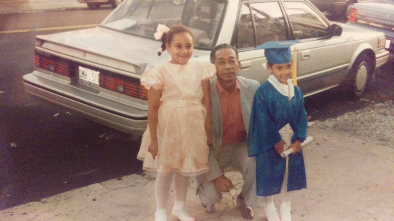 Oniqa and Sade Moonsammy as children with their grandfather, James Small.