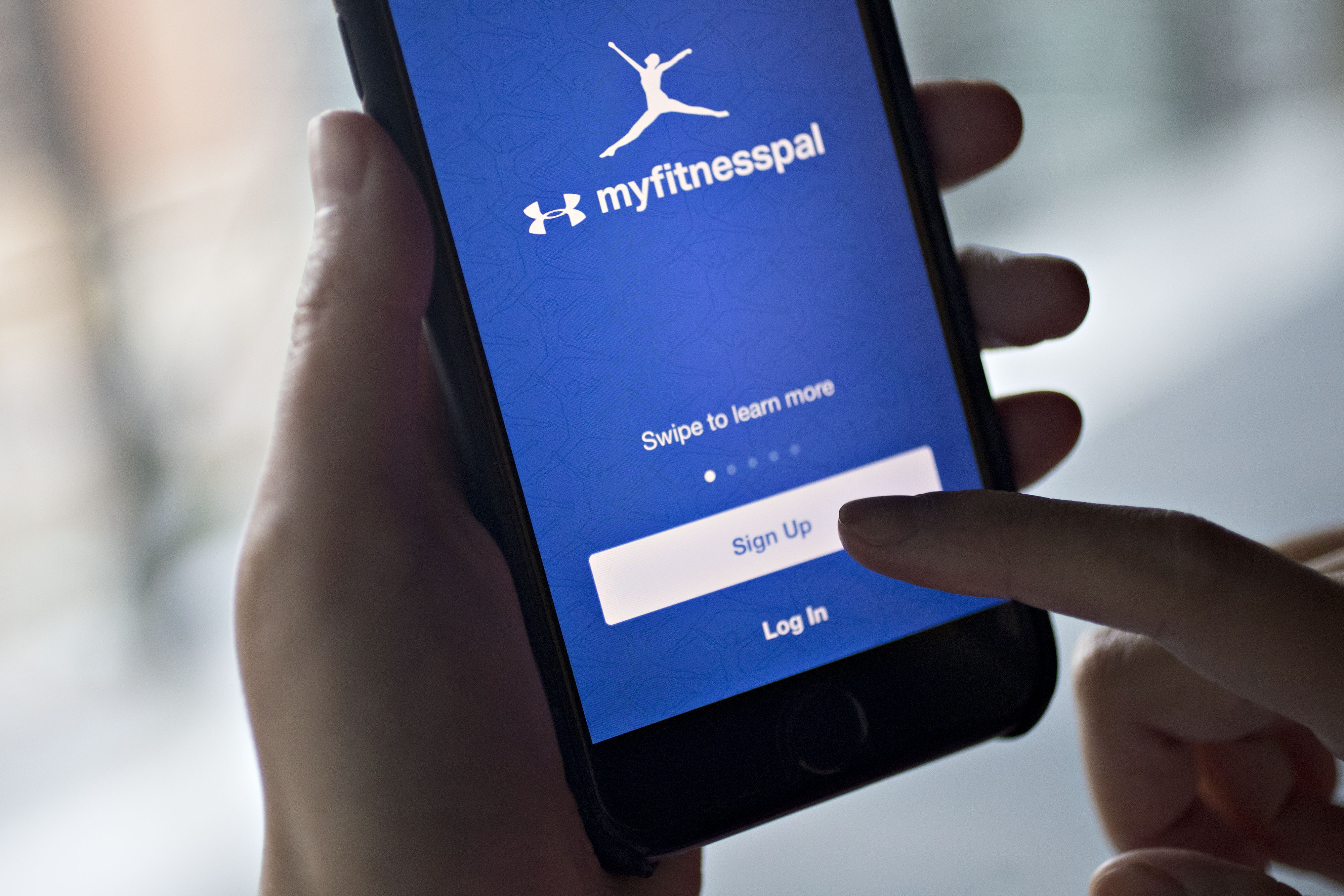The MyFitnessPal application is demonstrated for a photograph on an Apple Inc. iPhone in Washington, D.C., U.S., on Monday, Oct. 24, 2016. Under Armour Inc., which acquired MyFitnessPal in early 2016, is expected to release third-quarter earnings figures on October 25. (Photograph by Andrew Harrer—Bloomberg/Getty Images)
