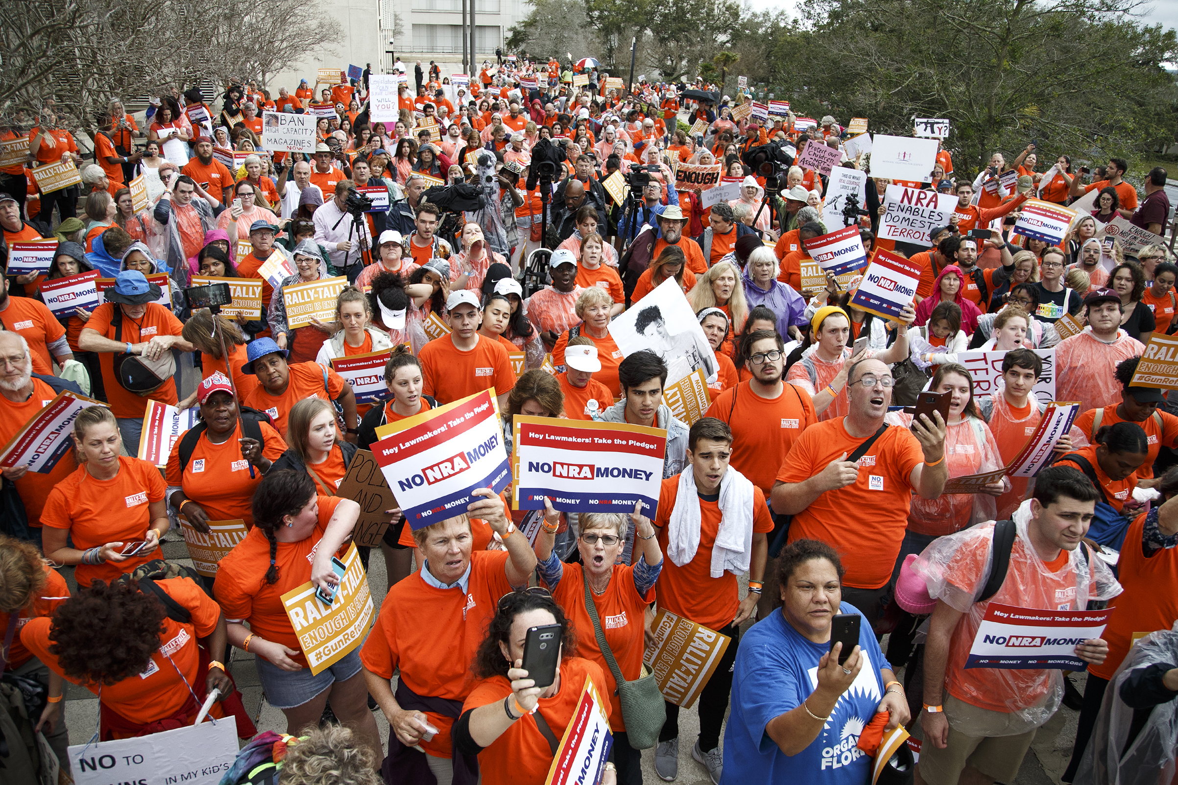 Activists hold up signs at the Florida State Capitol as they rally for gun reform legislation in Tallahassee, Fla., on Feb. 26, 2018. (Don Juan Moore—Getty Images)