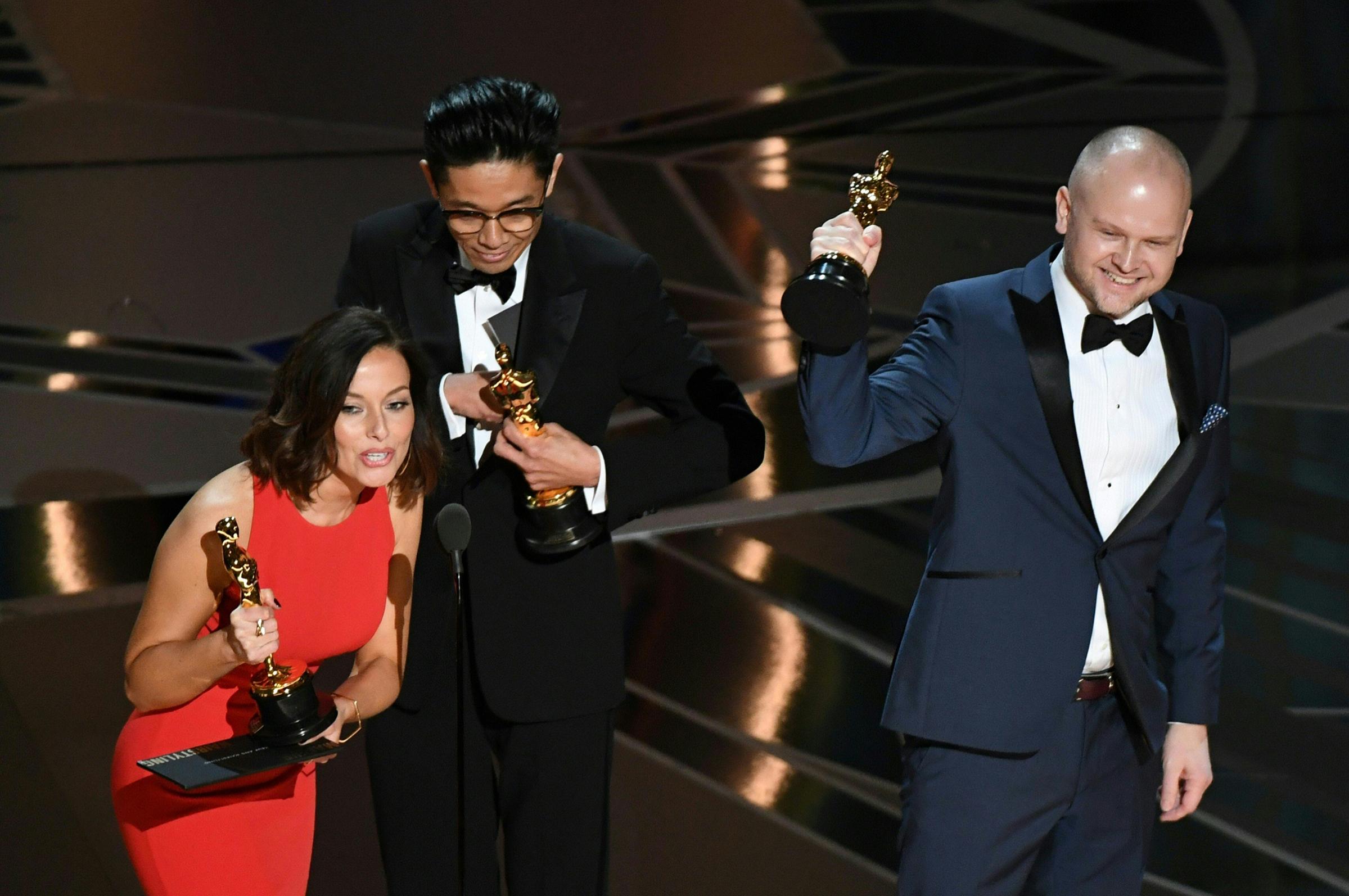 Make-Up and Hairstyling artists Lucy Sibbick, Kazuhiro Tsuji and David Malinowski accept the Oscar for Best Makeup and Hairstyling in Darkest Hour during the 90th Annual Academy Awards show on March 4, 2018 in Hollywood.