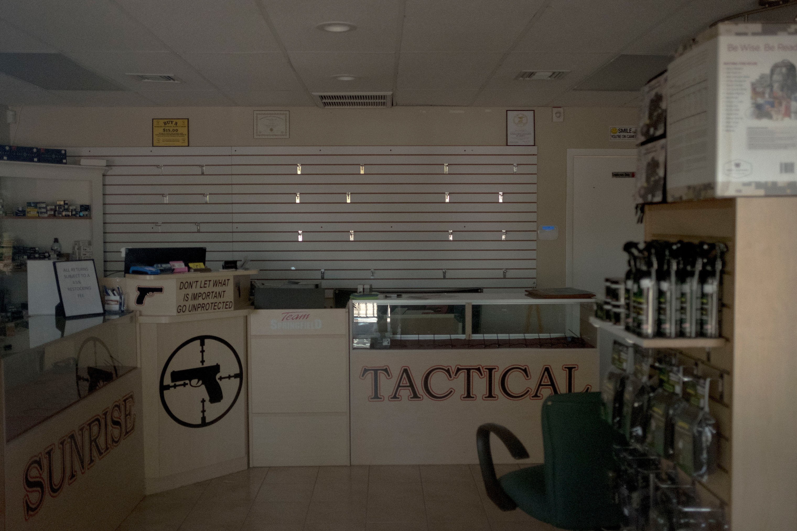 Sunrise Tactical Supply in Coral Springs, where accused shooter Nikolas Cruz bought his weapon. Just down the street from the high school, the store lay mostly empty and was closed indefinitely. A sign at the window stated “God Bless Our Troops…Especially Our Snipers.” (Gabriella Demczuk for TIME)