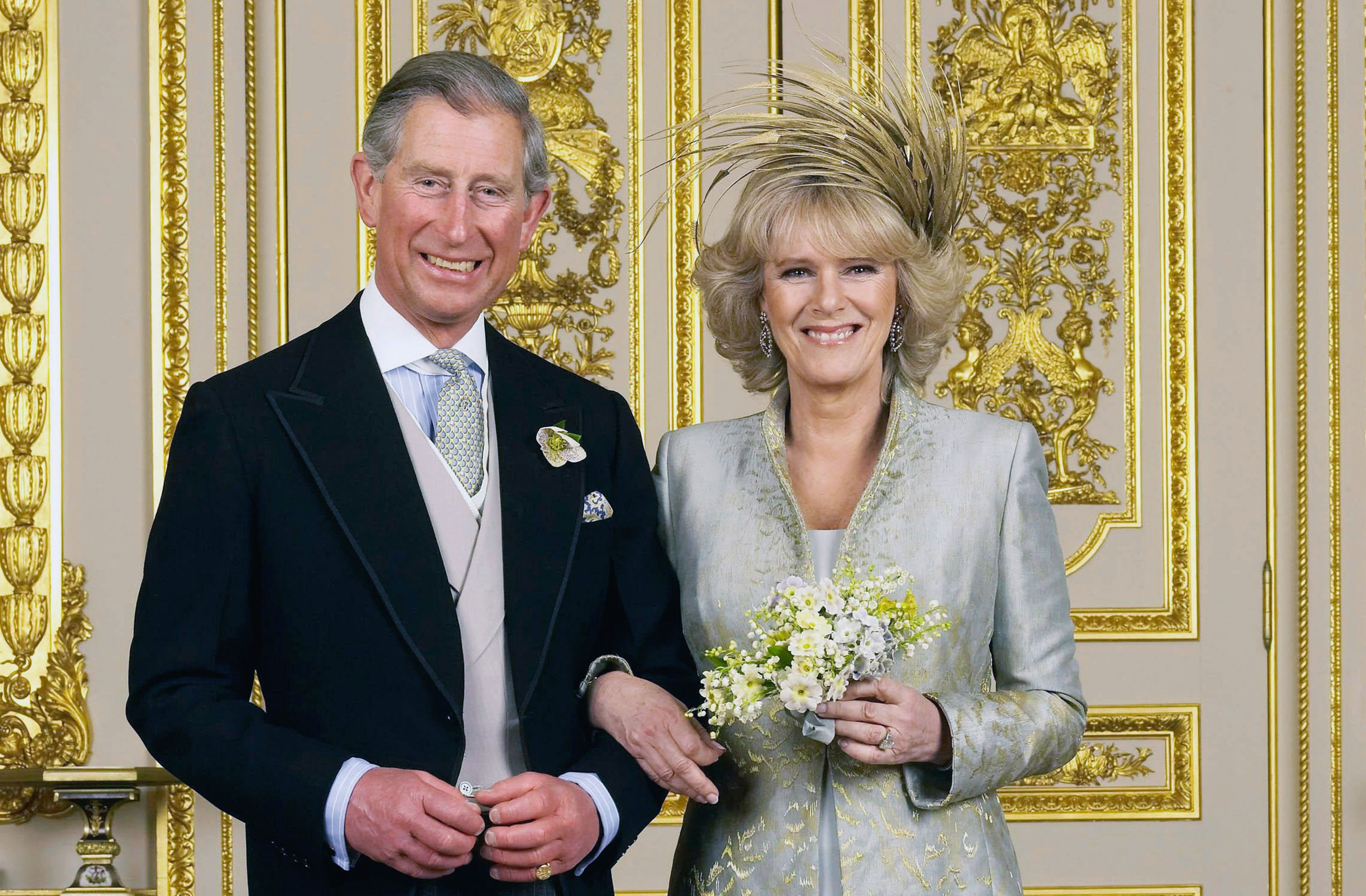 Prince Charles, the Prince of Wales, and his wife Camilla, the Duchess Of Cornwall, pose in the White Drawing Room at Windsor Castle for the Official Wedding photograph following their marriage on April 9, 2005 in Windsor, England. Tim Graham/Getty Images (Tim Graham/Getty Images)