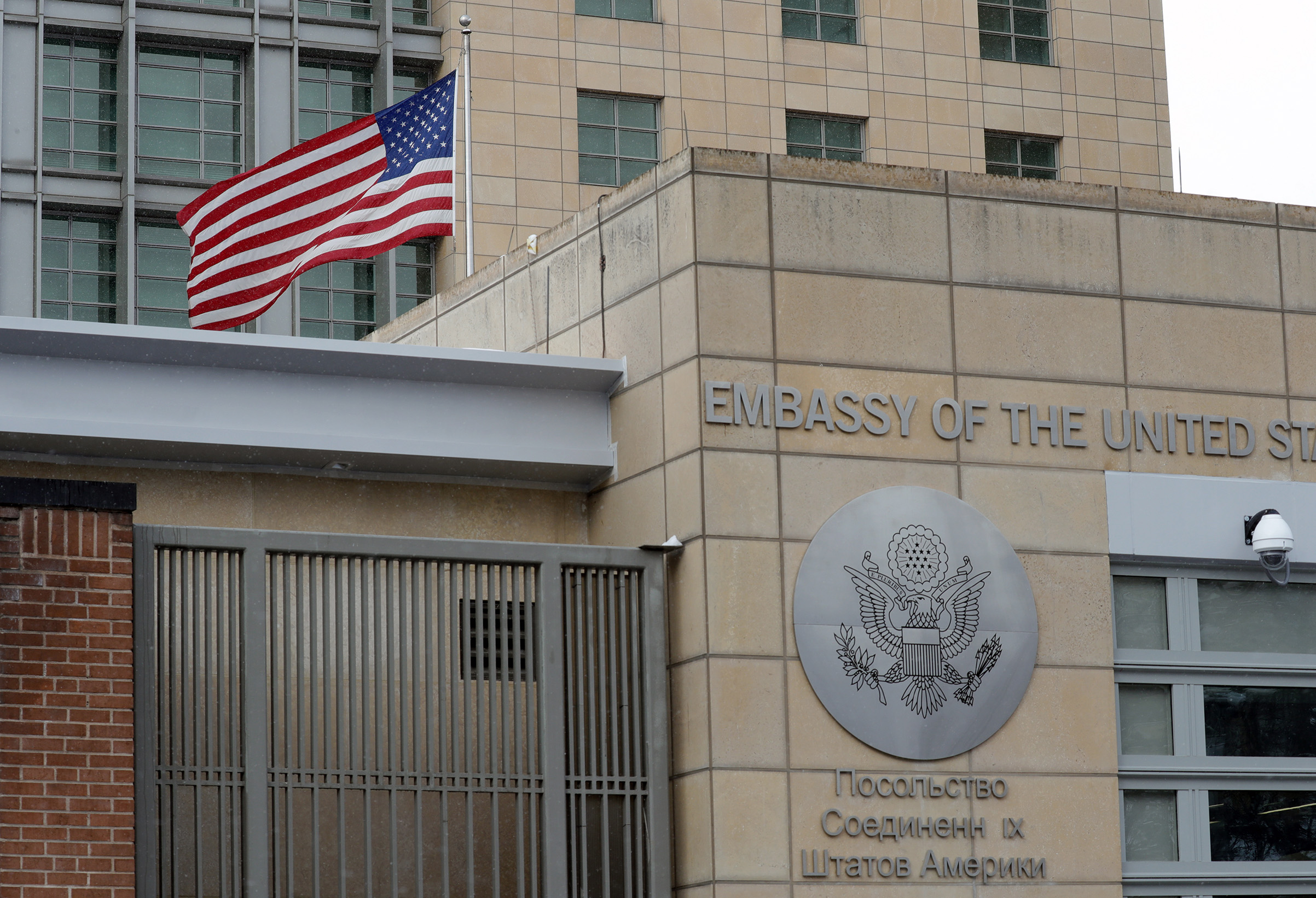 US national flag waving by the Embassy of the United States of America. The USA has decided to expel 60 Russian diplomats and close the Consulate General of the Russian Federation in Seattle over the poisoning of former Russian military intelligence officer Sergei Skripal and his daughter Yulia in Salisbury, Britain on 4 March 2018 (Mikhail Japaridze—TASS/Getty Images)