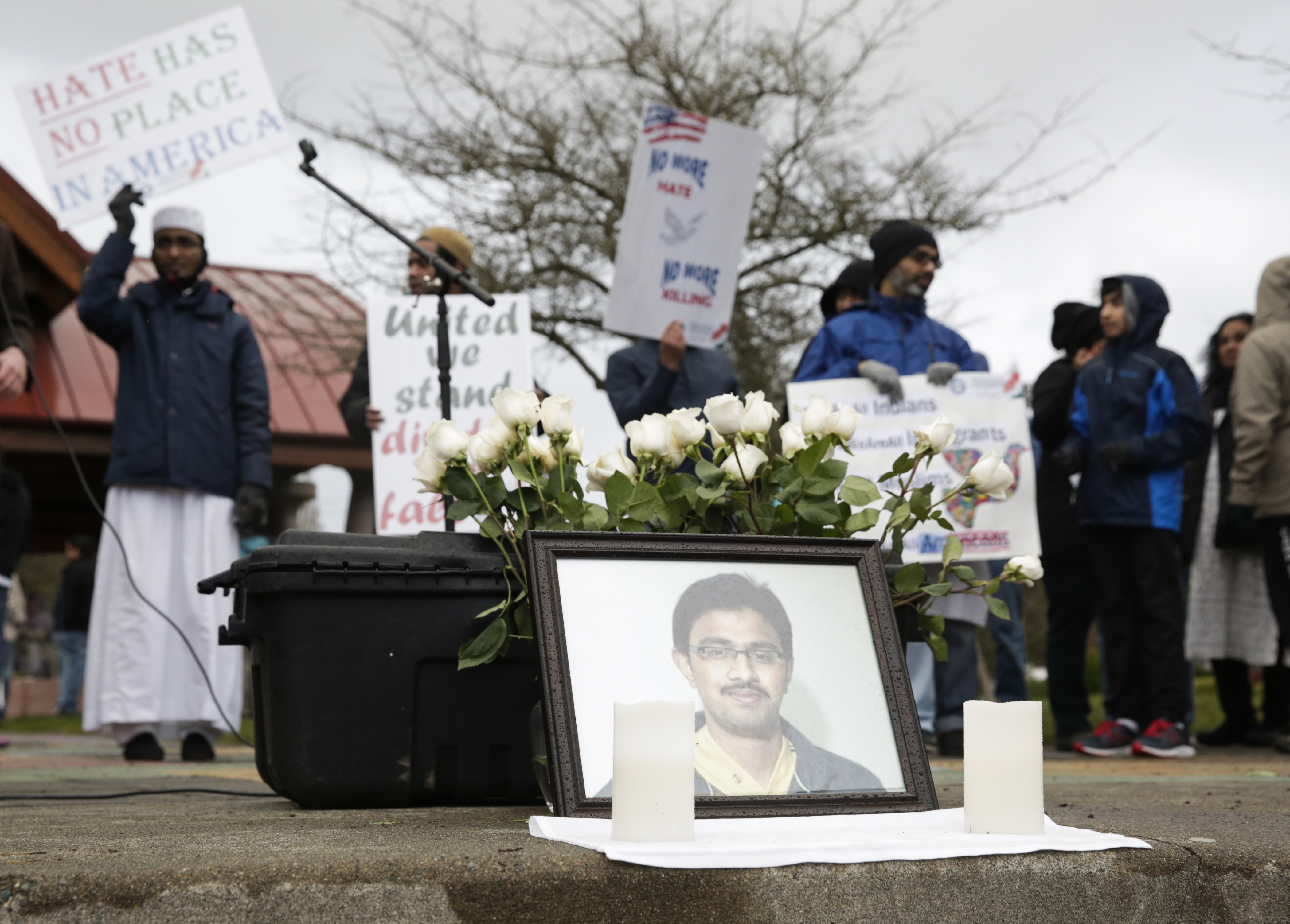A photo of Srinivas Kuchibhotla, the 32-year-old Indian engineer killed at a bar in Olathe, Kansas, is pictured during a peace vigil in Bellevue, Washington on March 5, 2017 (Jason Redmond&mdash;AFP/Getty Images)