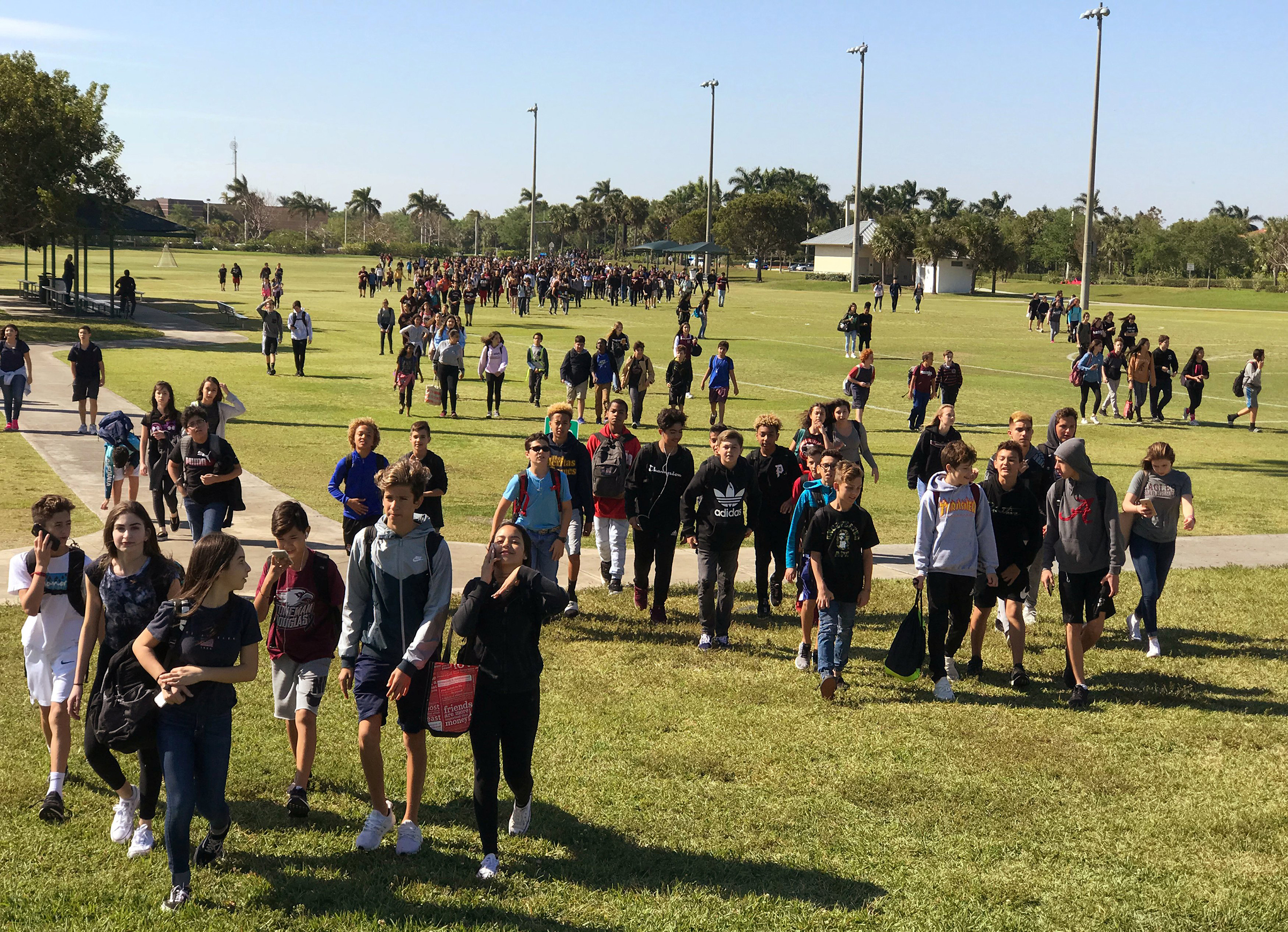 Students from West Lakes Middle School and Marjory Stoneman Douglas High School walkout during National School Walkout to protest gun violence in Parkland, Fla., March 14, 2018. (Joe Skipper—Reuters)