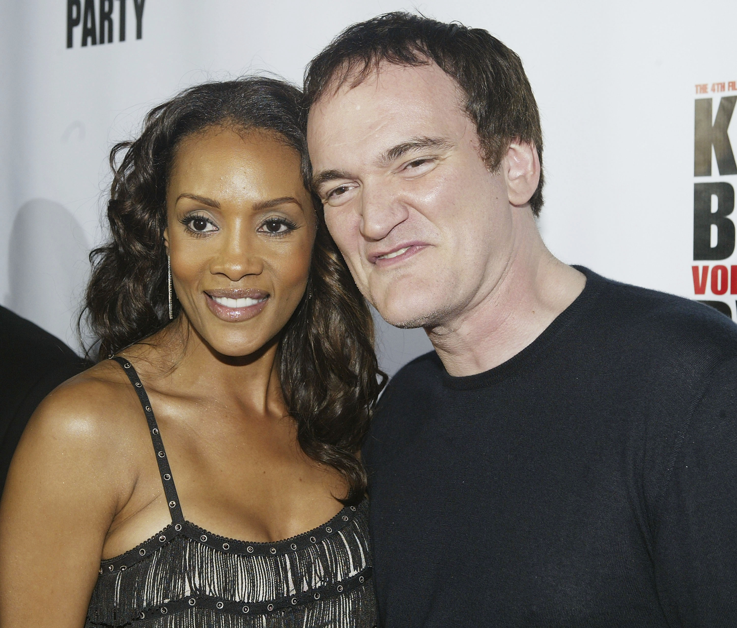 Vivica A. Fox and Quentin Tarantino attend the "Kill Bill Vol. 1 Video Release Party" on April 12, 2004. (Mark Mainz—2004 Getty Images)