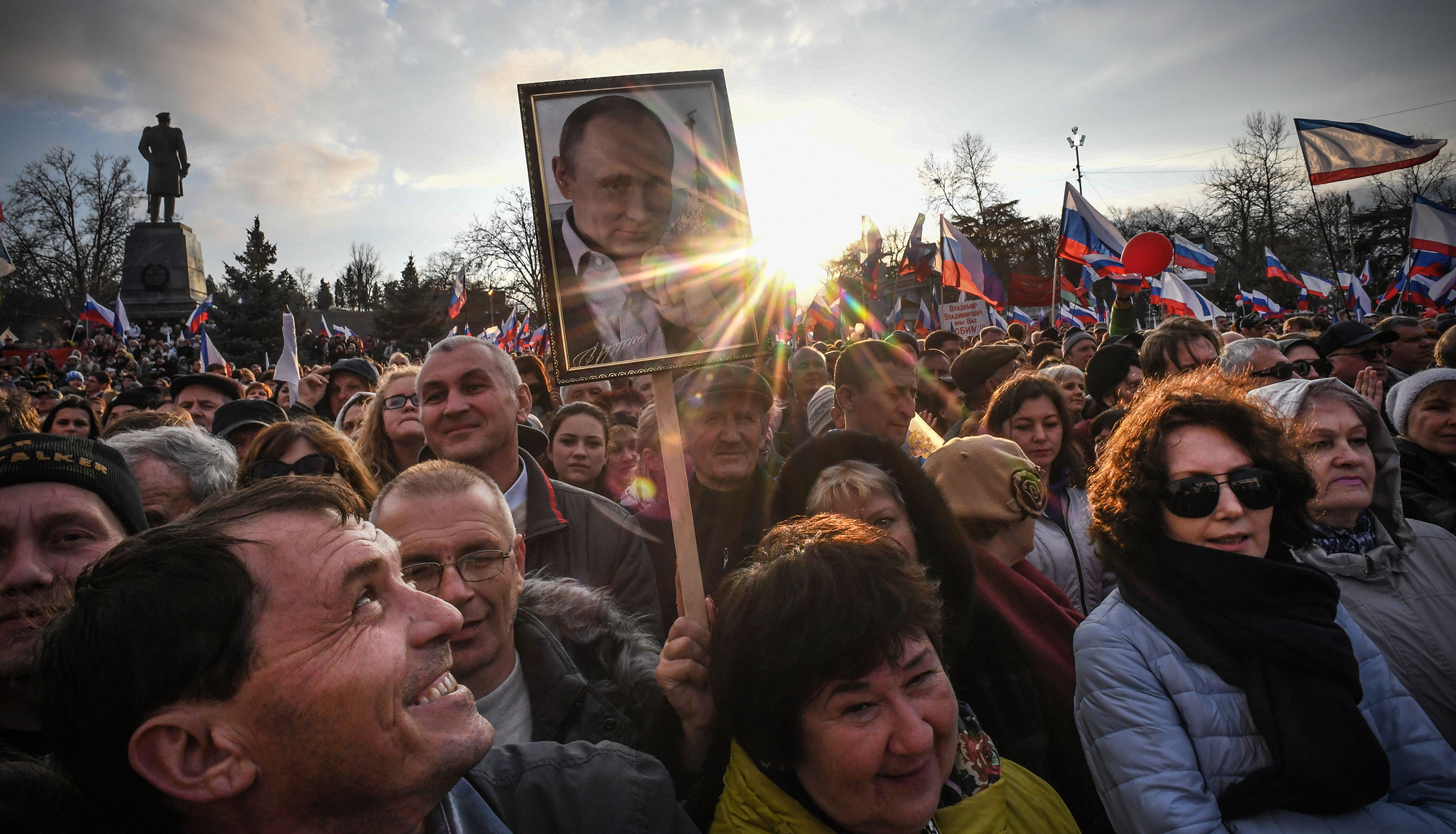 Supporters of Russian President Vladimir Putin gather for a rally to celebrate the fourth anniversary of Russia's annexation of Crimea at Sevastopol's Nakhimov Square on March 14, 2018. (Yuri Kadobnov—AFP/Getty Images)